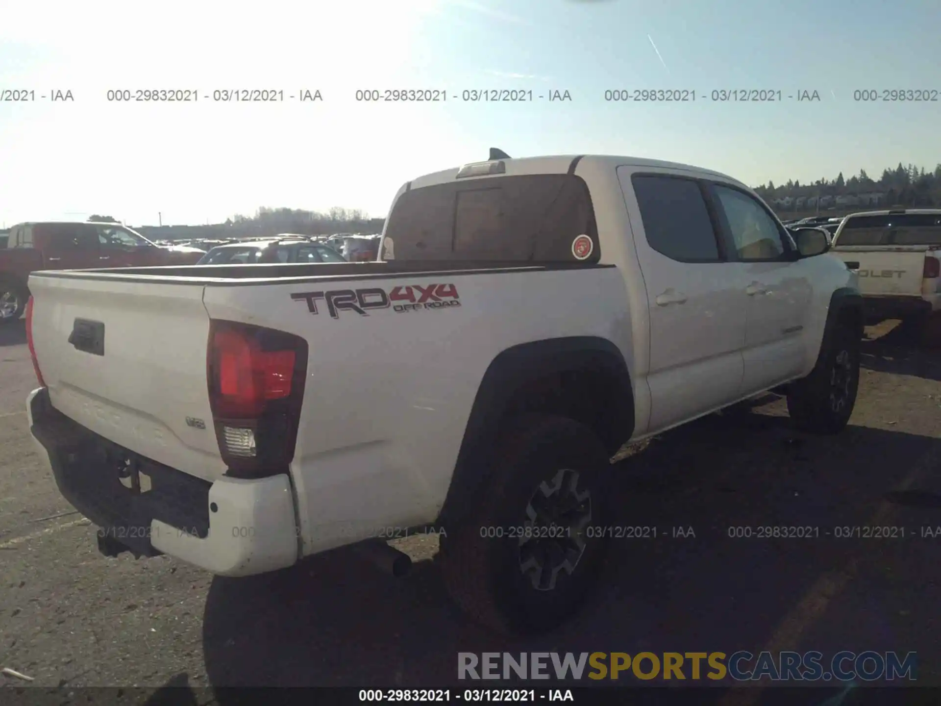 4 Photograph of a damaged car 3TMCZ5AN7KM268165 TOYOTA TACOMA 4WD 2019