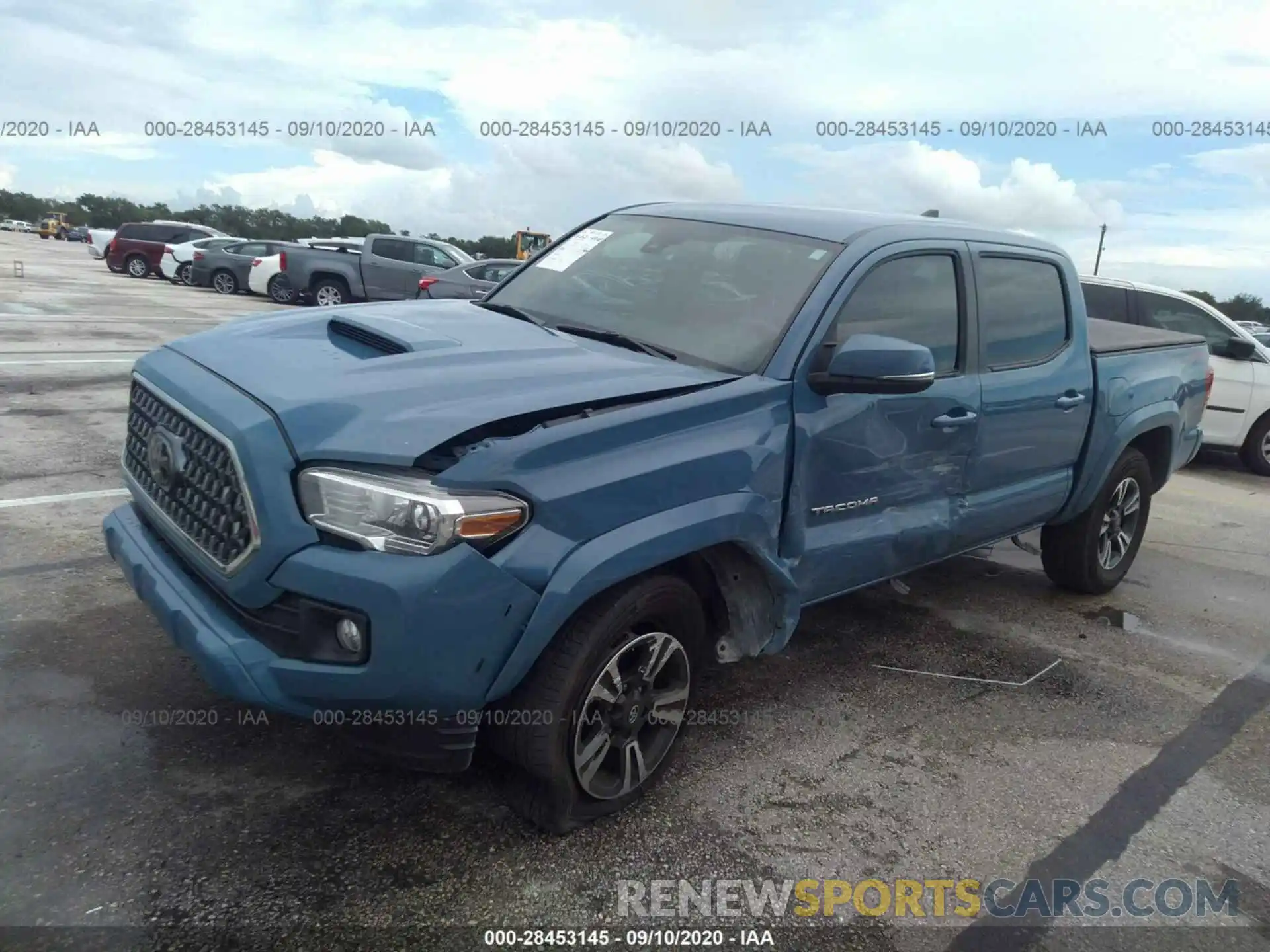 2 Photograph of a damaged car 3TMCZ5AN7KM271857 TOYOTA TACOMA 4WD 2019