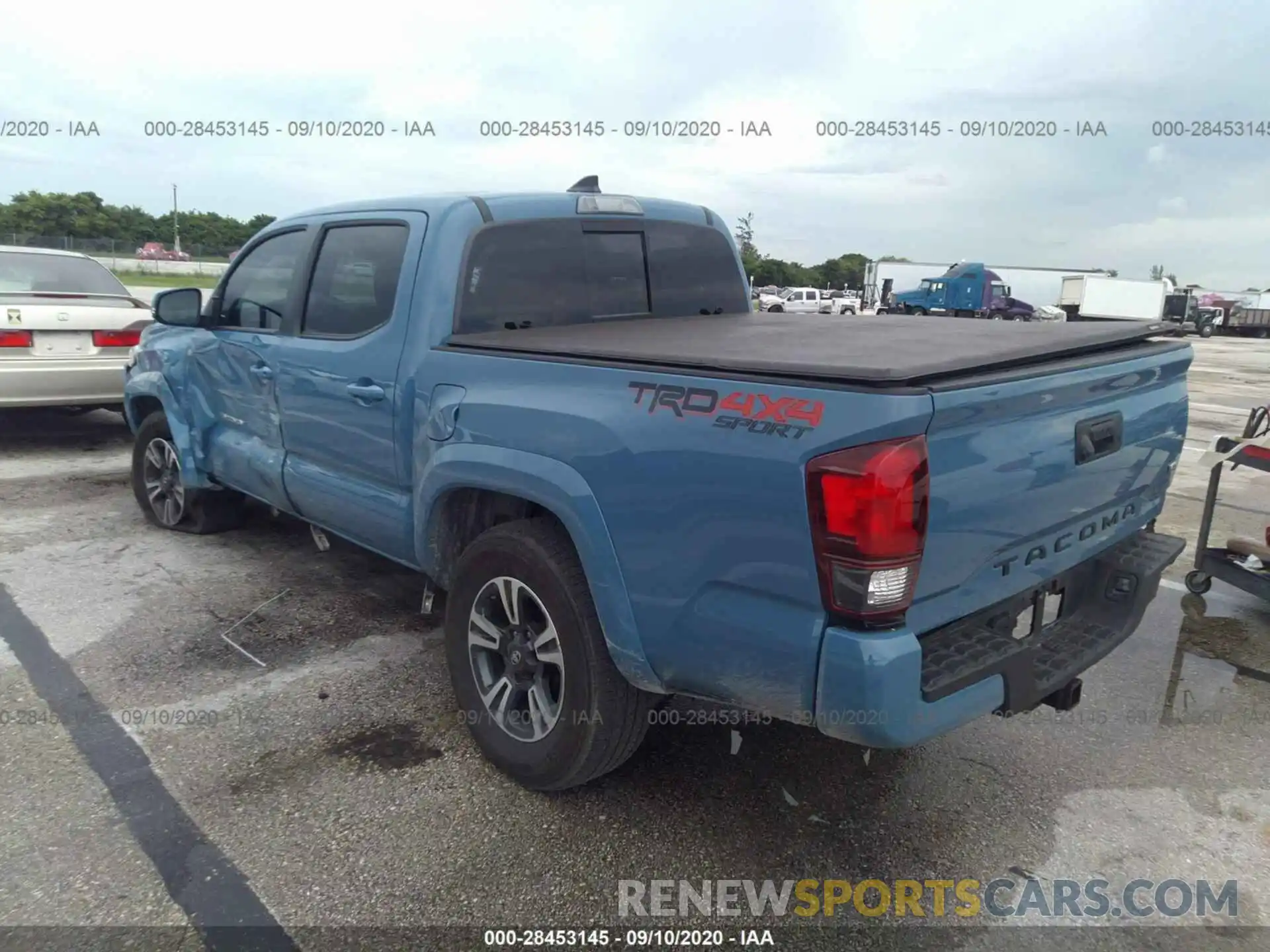 3 Photograph of a damaged car 3TMCZ5AN7KM271857 TOYOTA TACOMA 4WD 2019