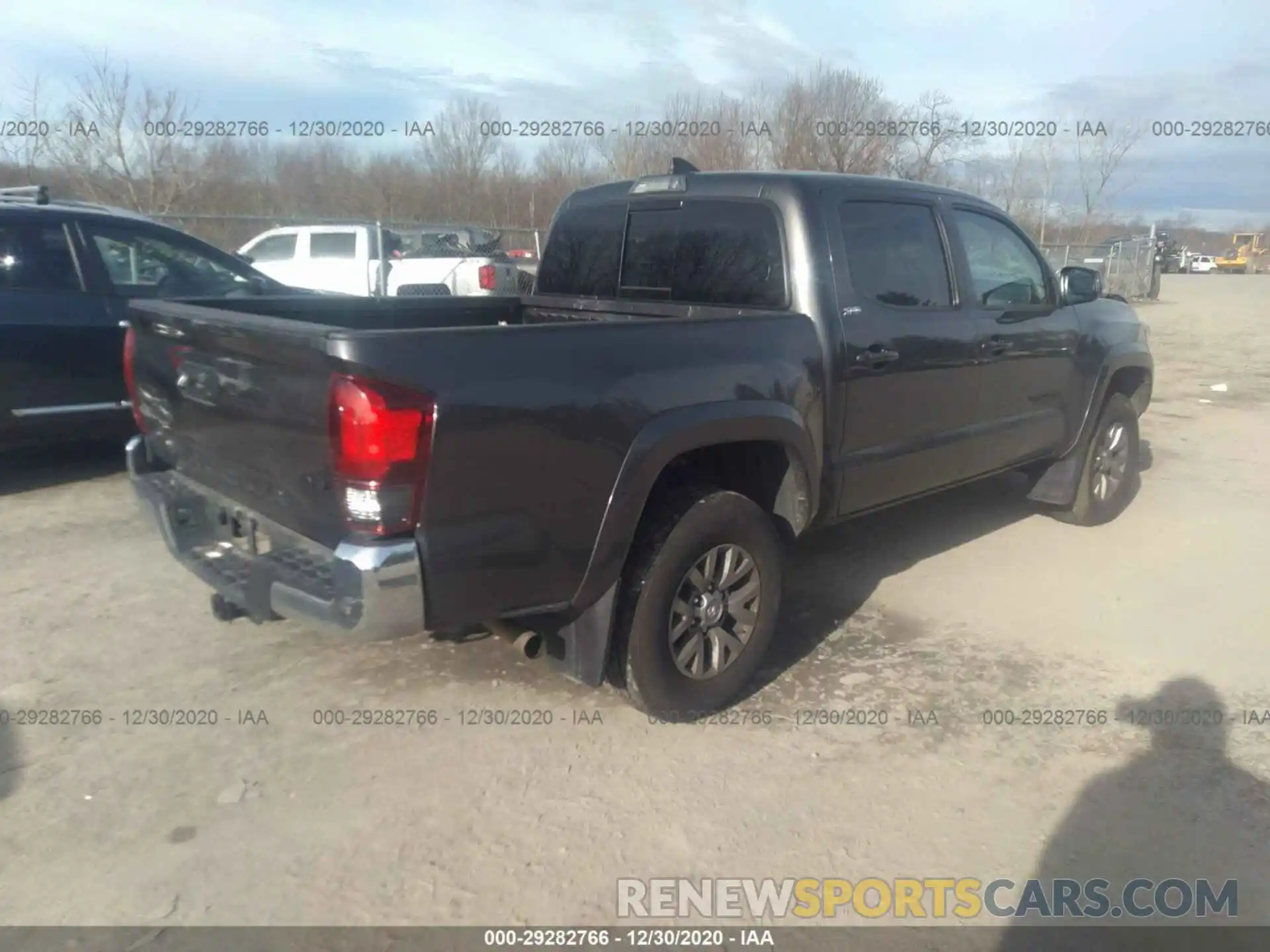 4 Photograph of a damaged car 3TMCZ5AN7KM276430 TOYOTA TACOMA 4WD 2019