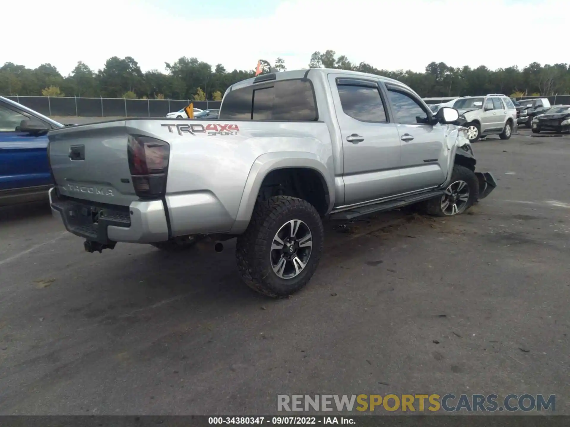 4 Photograph of a damaged car 3TMCZ5AN7KM278470 TOYOTA TACOMA 4WD 2019