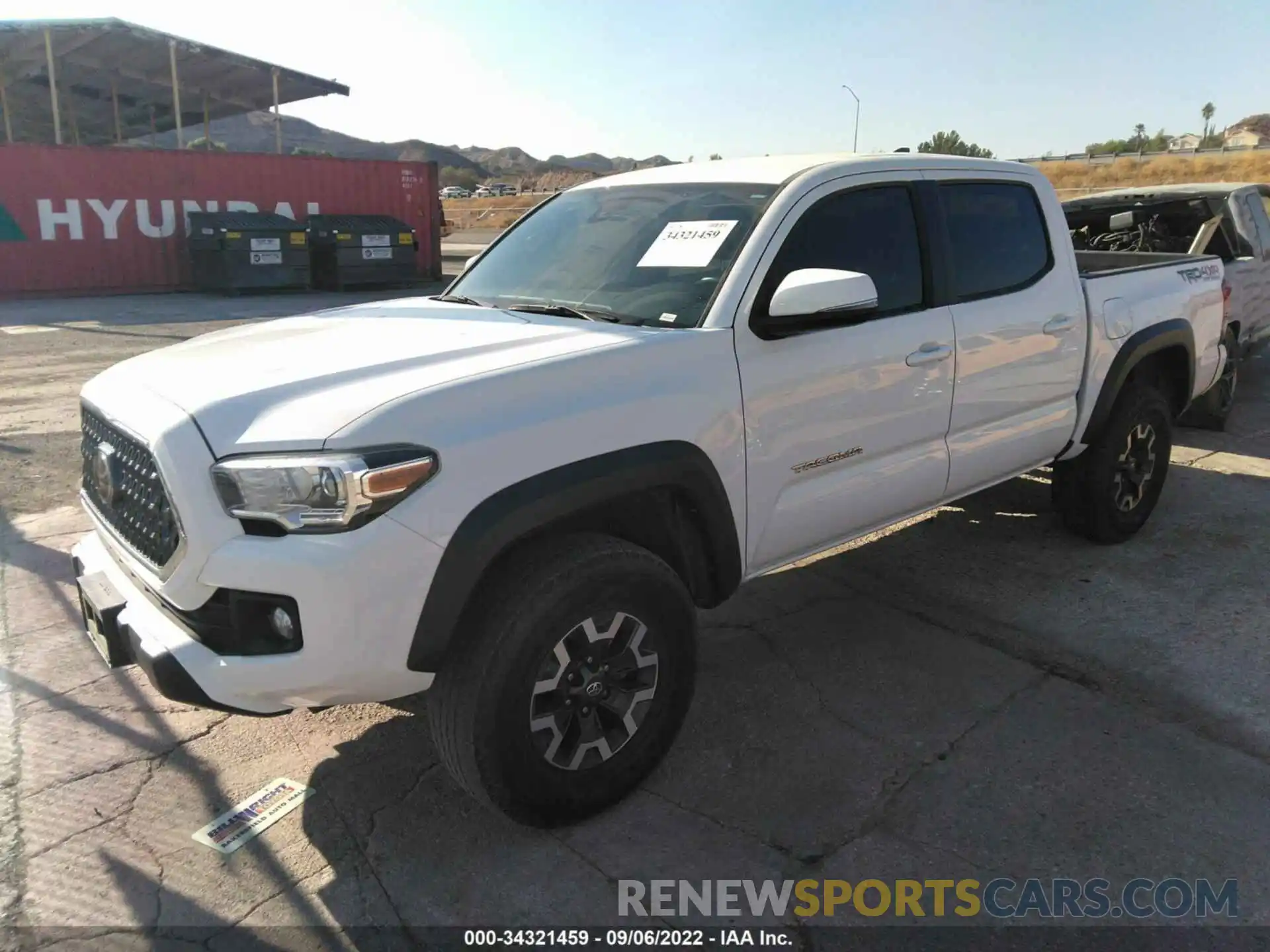 2 Photograph of a damaged car 3TMCZ5AN7KM283829 TOYOTA TACOMA 4WD 2019