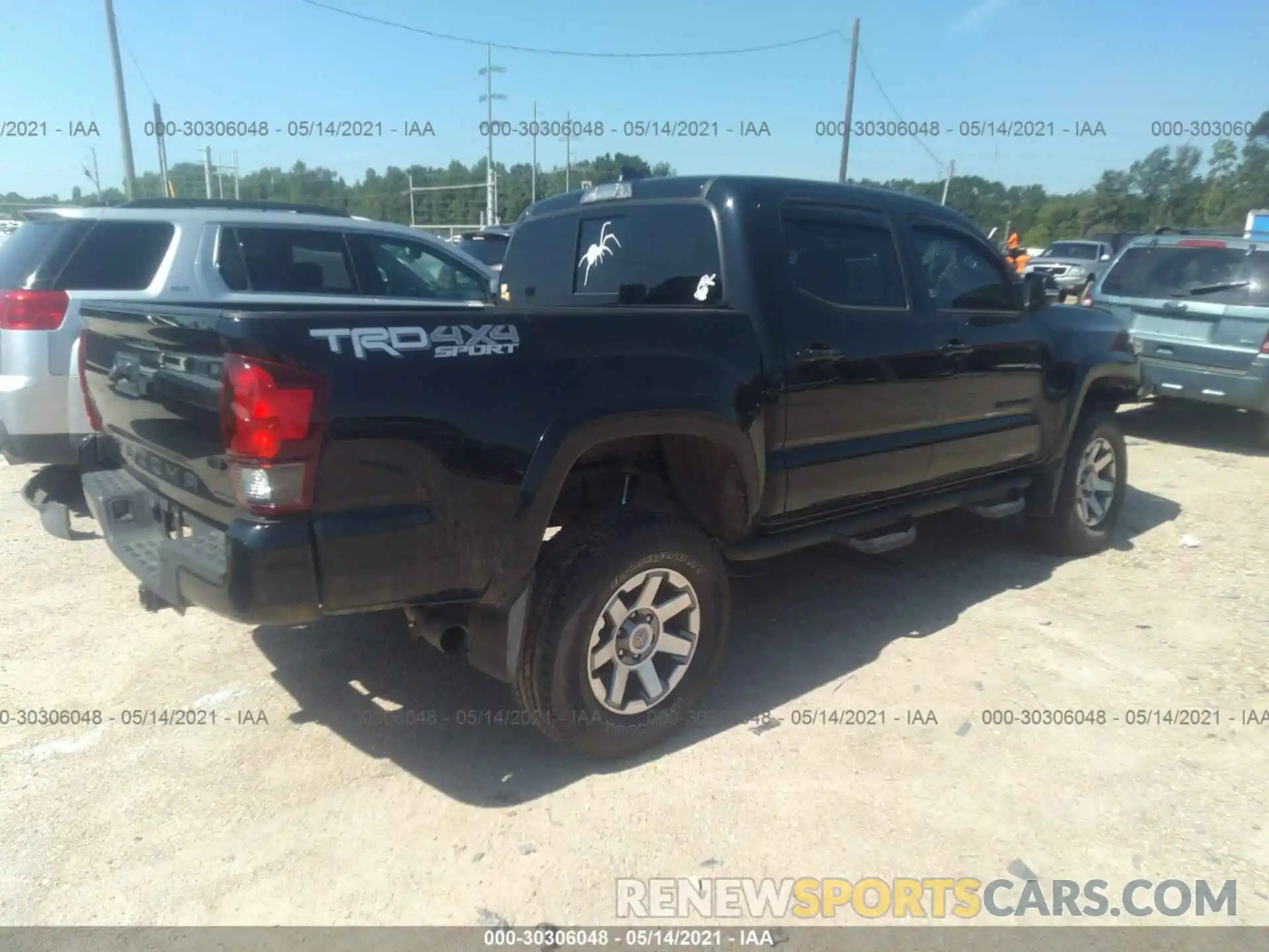 4 Photograph of a damaged car 3TMCZ5AN7KM285855 TOYOTA TACOMA 4WD 2019