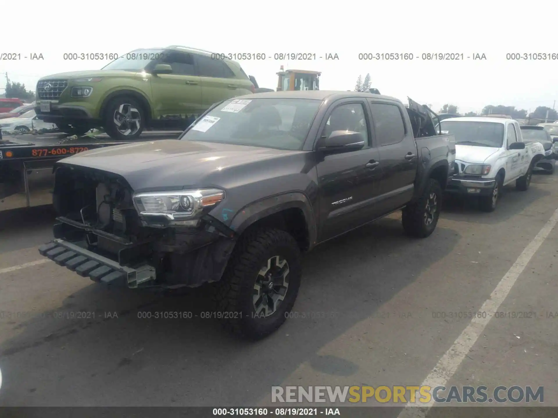 2 Photograph of a damaged car 3TMCZ5AN7KM287511 TOYOTA TACOMA 4WD 2019