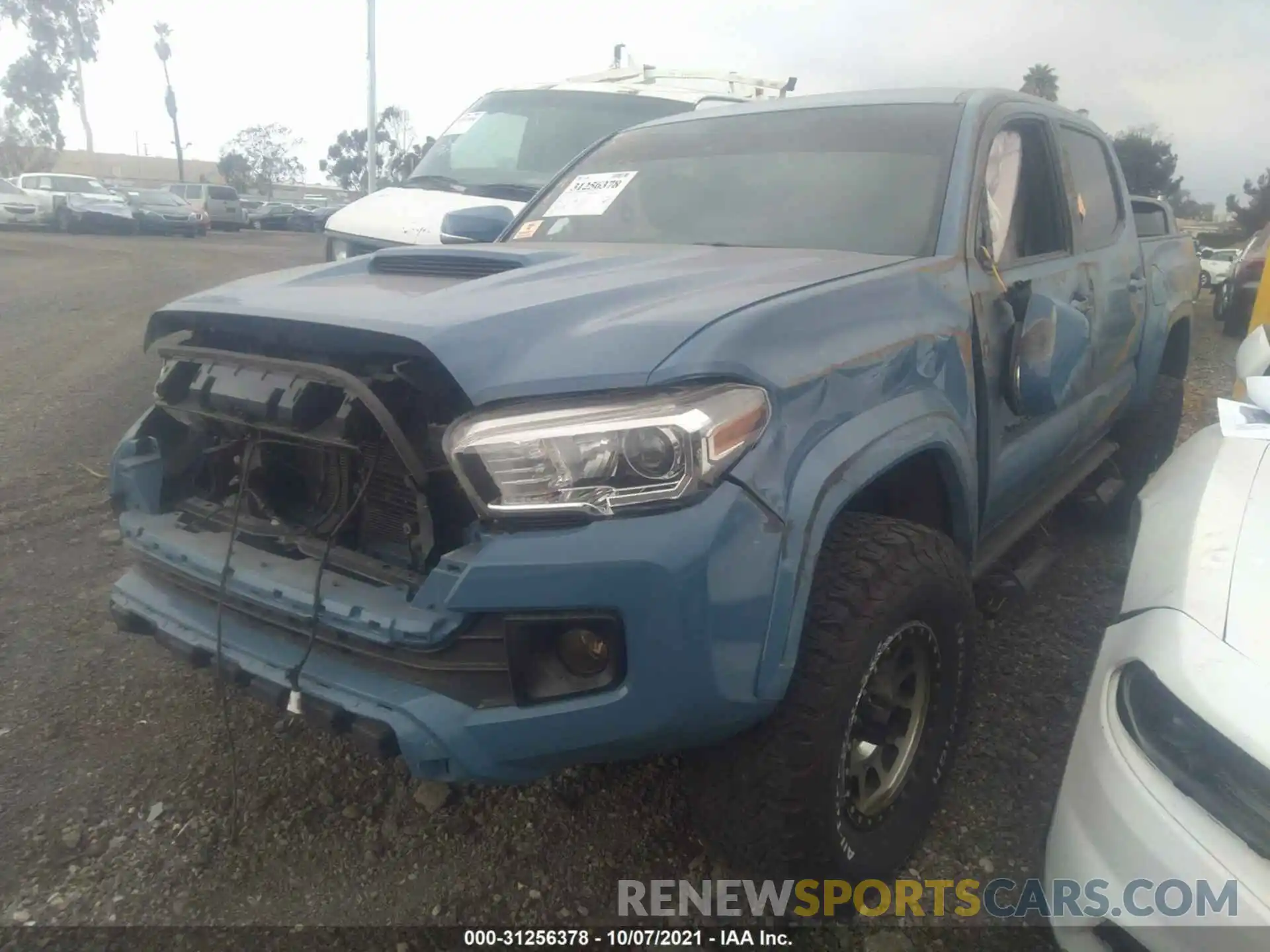 2 Photograph of a damaged car 3TMCZ5AN8KM208279 TOYOTA TACOMA 4WD 2019