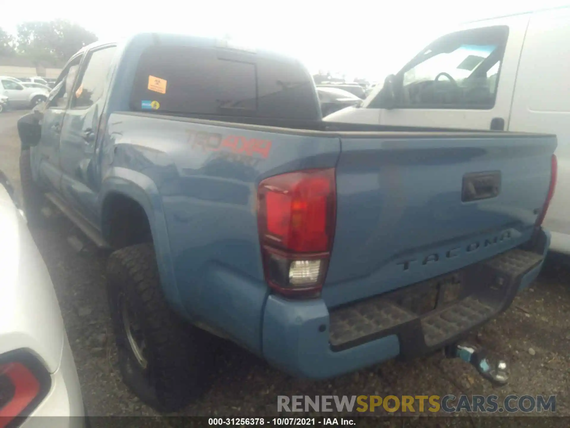 3 Photograph of a damaged car 3TMCZ5AN8KM208279 TOYOTA TACOMA 4WD 2019