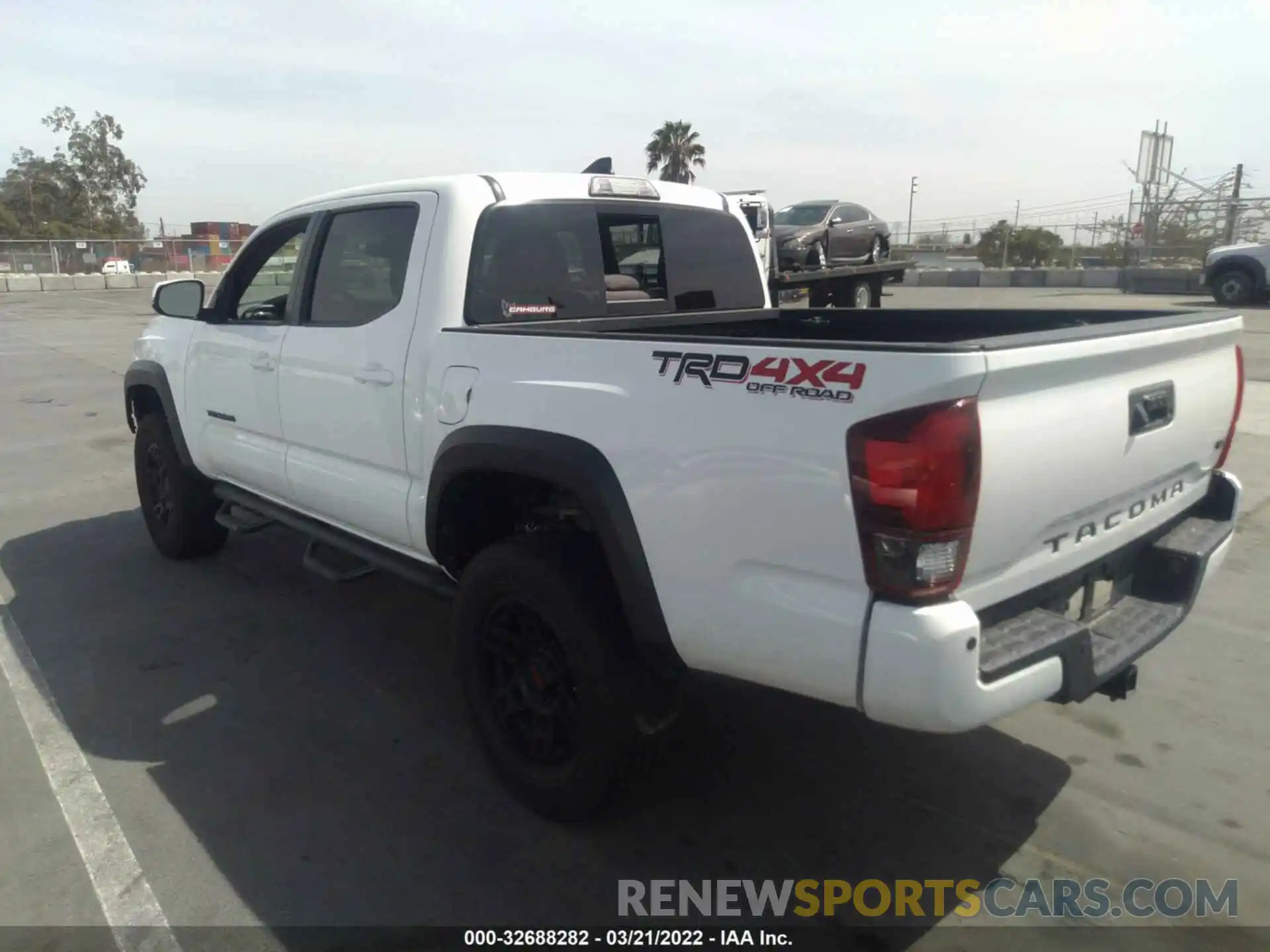 3 Photograph of a damaged car 3TMCZ5AN8KM218939 TOYOTA TACOMA 4WD 2019