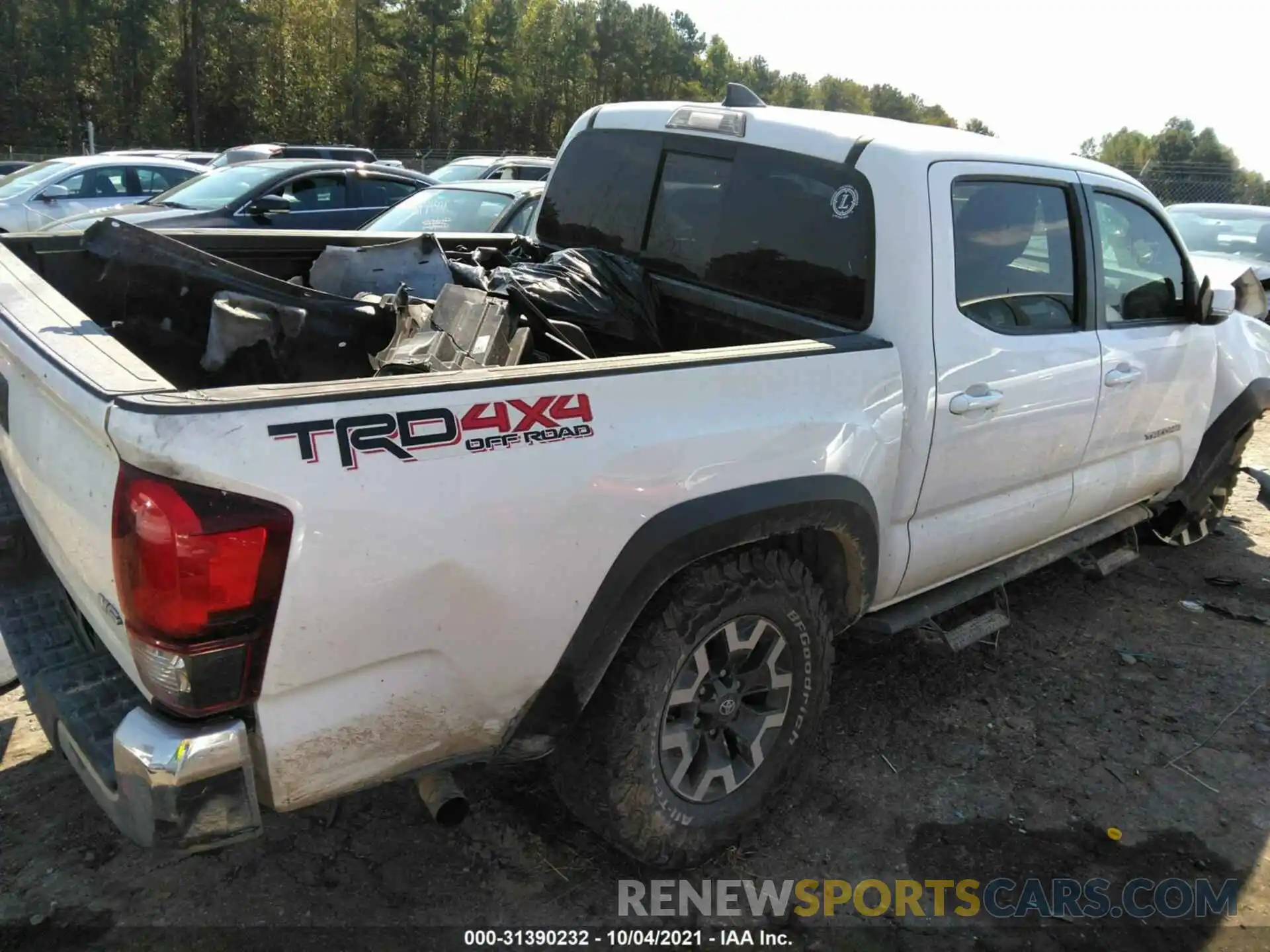 4 Photograph of a damaged car 3TMCZ5AN8KM219833 TOYOTA TACOMA 4WD 2019