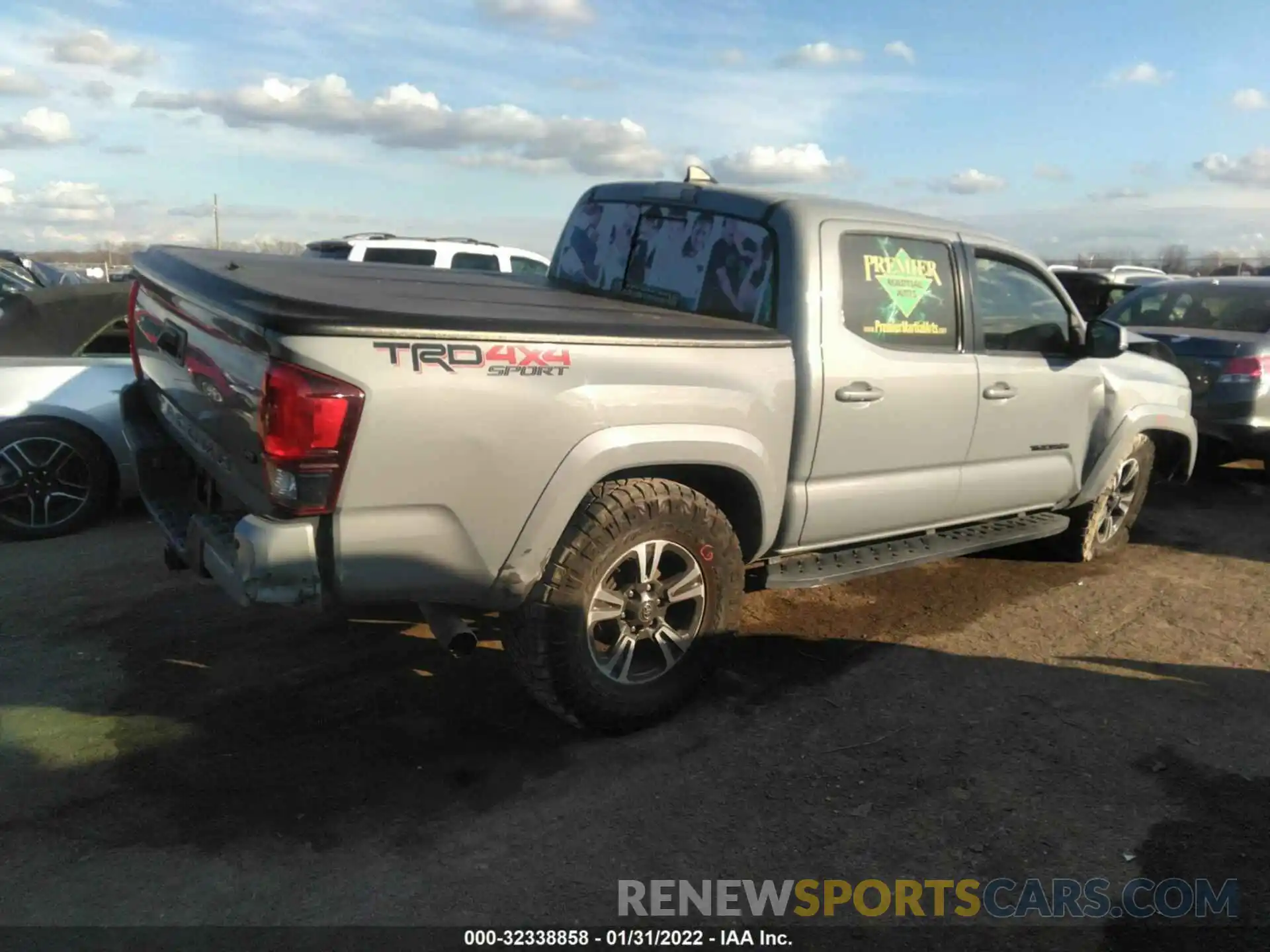 4 Photograph of a damaged car 3TMCZ5AN8KM231836 TOYOTA TACOMA 4WD 2019