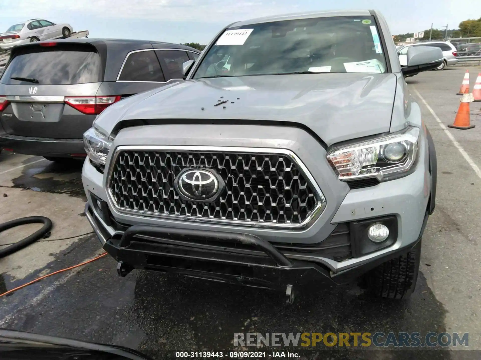 12 Photograph of a damaged car 3TMCZ5AN8KM250452 TOYOTA TACOMA 4WD 2019