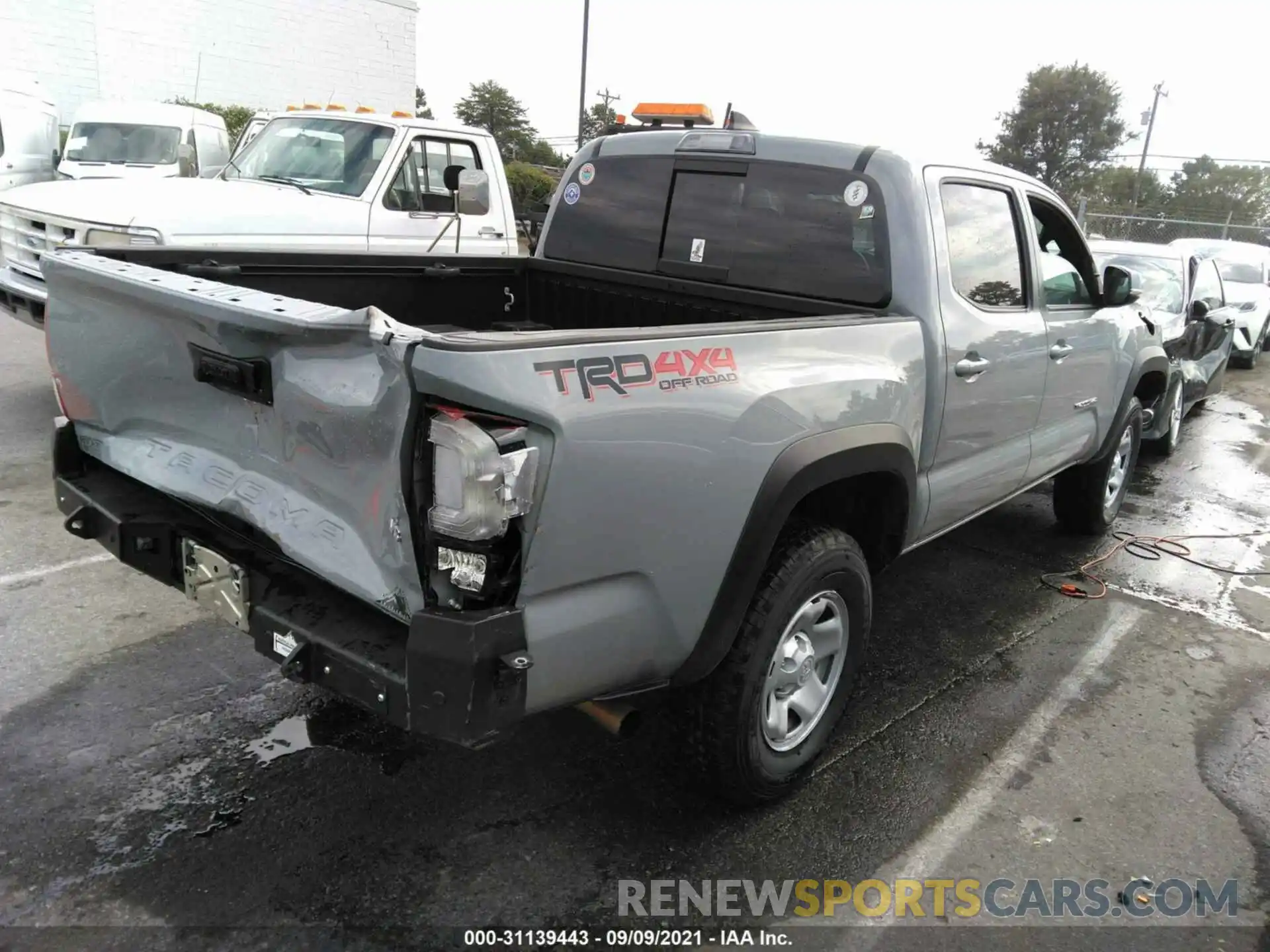 4 Photograph of a damaged car 3TMCZ5AN8KM250452 TOYOTA TACOMA 4WD 2019