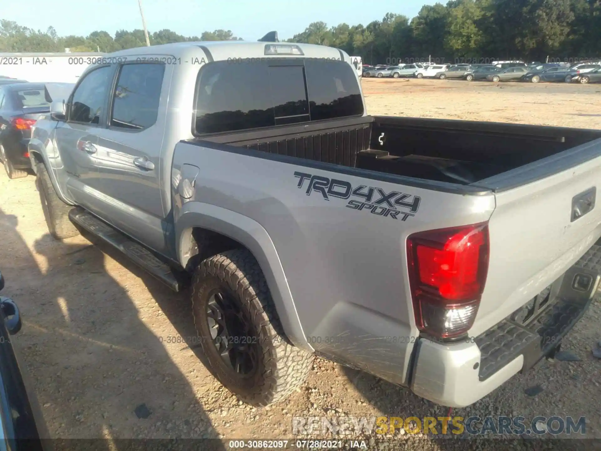 3 Photograph of a damaged car 3TMCZ5AN8KM254095 TOYOTA TACOMA 4WD 2019