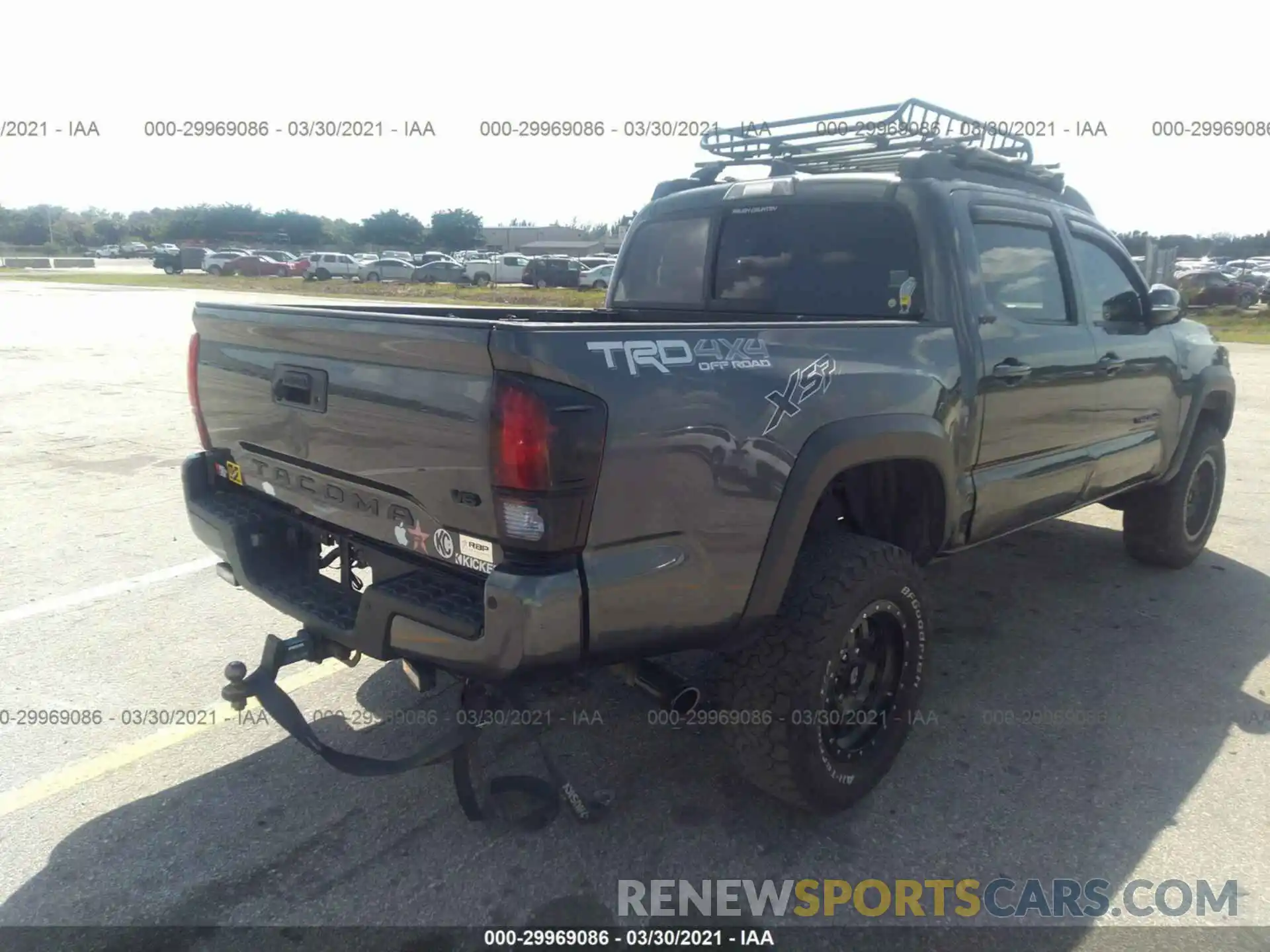 4 Photograph of a damaged car 3TMCZ5AN8KM258518 TOYOTA TACOMA 4WD 2019