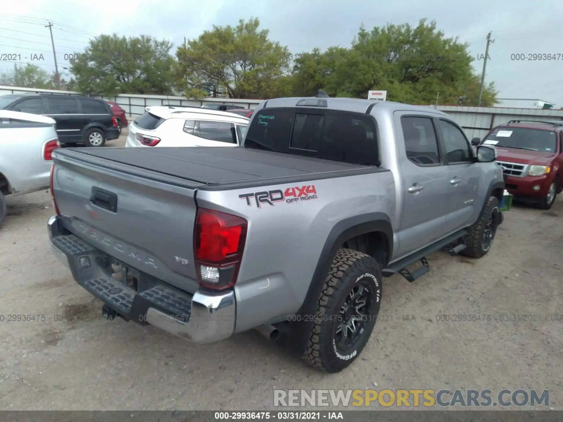 4 Photograph of a damaged car 3TMCZ5AN8KM264643 TOYOTA TACOMA 4WD 2019