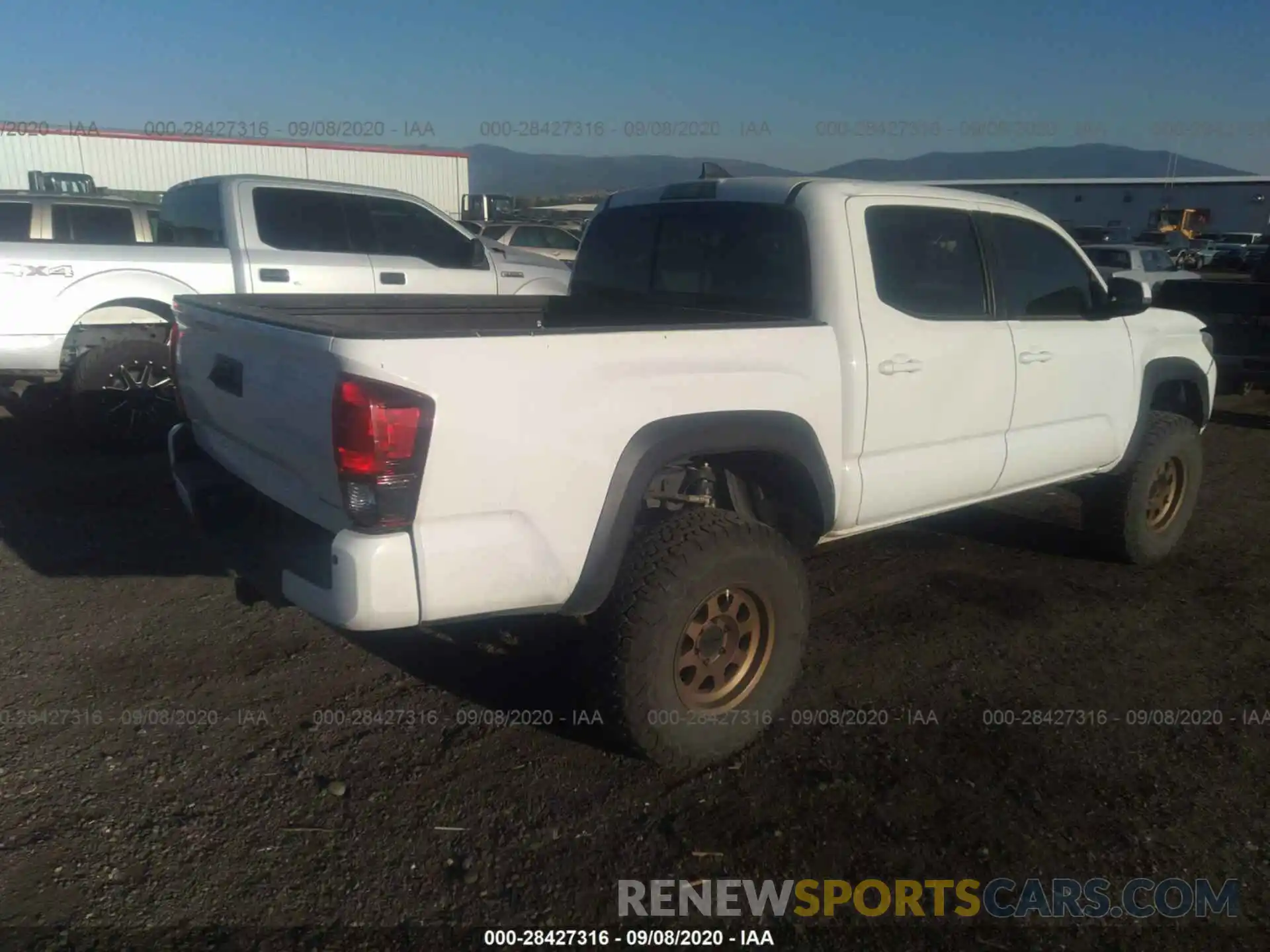 4 Photograph of a damaged car 3TMCZ5AN8KM269972 TOYOTA TACOMA 4WD 2019