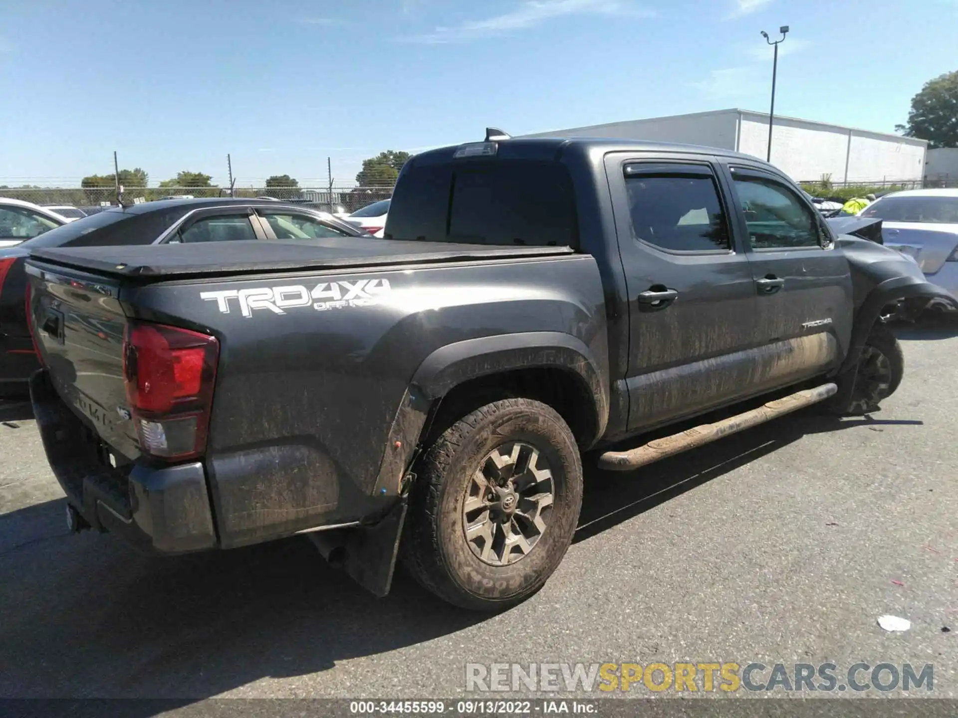 4 Photograph of a damaged car 3TMCZ5AN9KM203382 TOYOTA TACOMA 4WD 2019