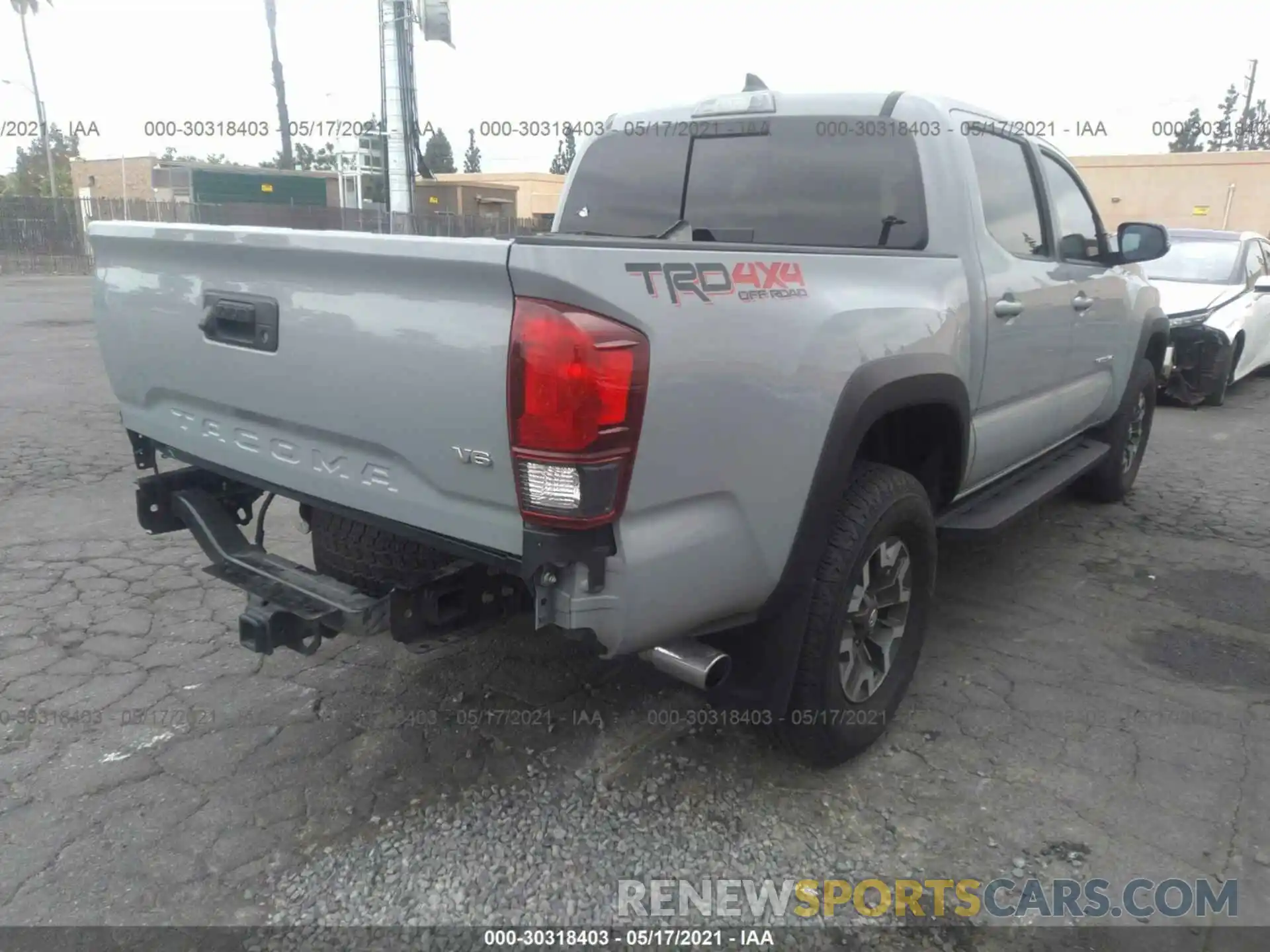 4 Photograph of a damaged car 3TMCZ5AN9KM204743 TOYOTA TACOMA 4WD 2019