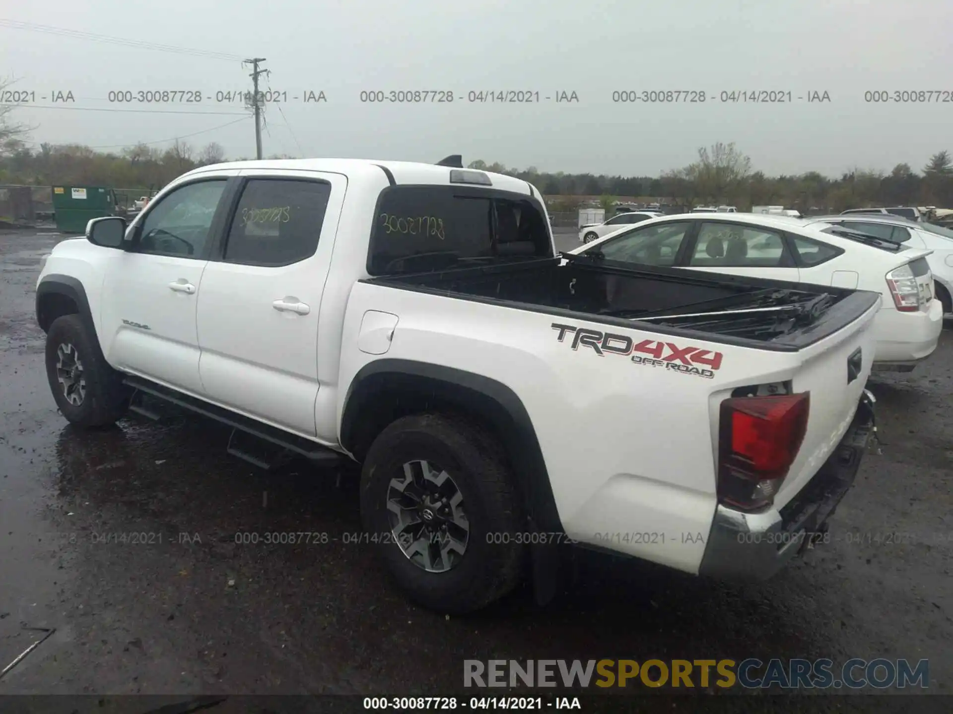 3 Photograph of a damaged car 3TMCZ5AN9KM210347 TOYOTA TACOMA 4WD 2019