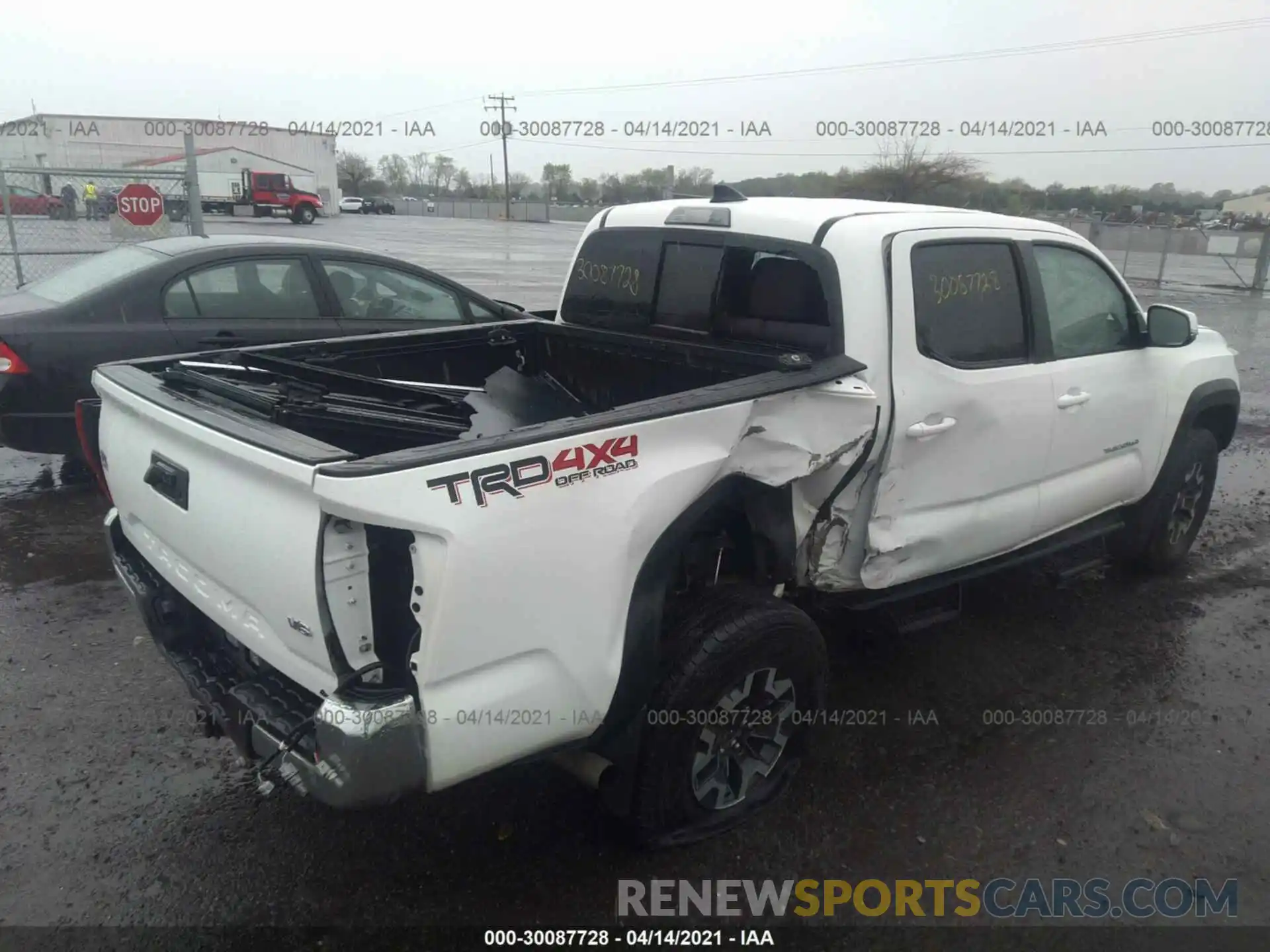 4 Photograph of a damaged car 3TMCZ5AN9KM210347 TOYOTA TACOMA 4WD 2019