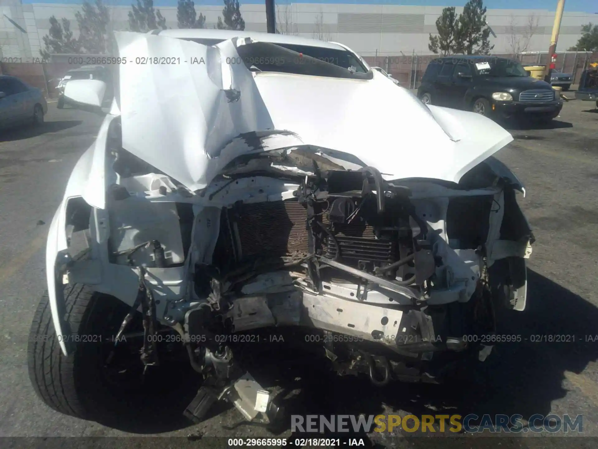 6 Photograph of a damaged car 3TMCZ5AN9KM211241 TOYOTA TACOMA 4WD 2019