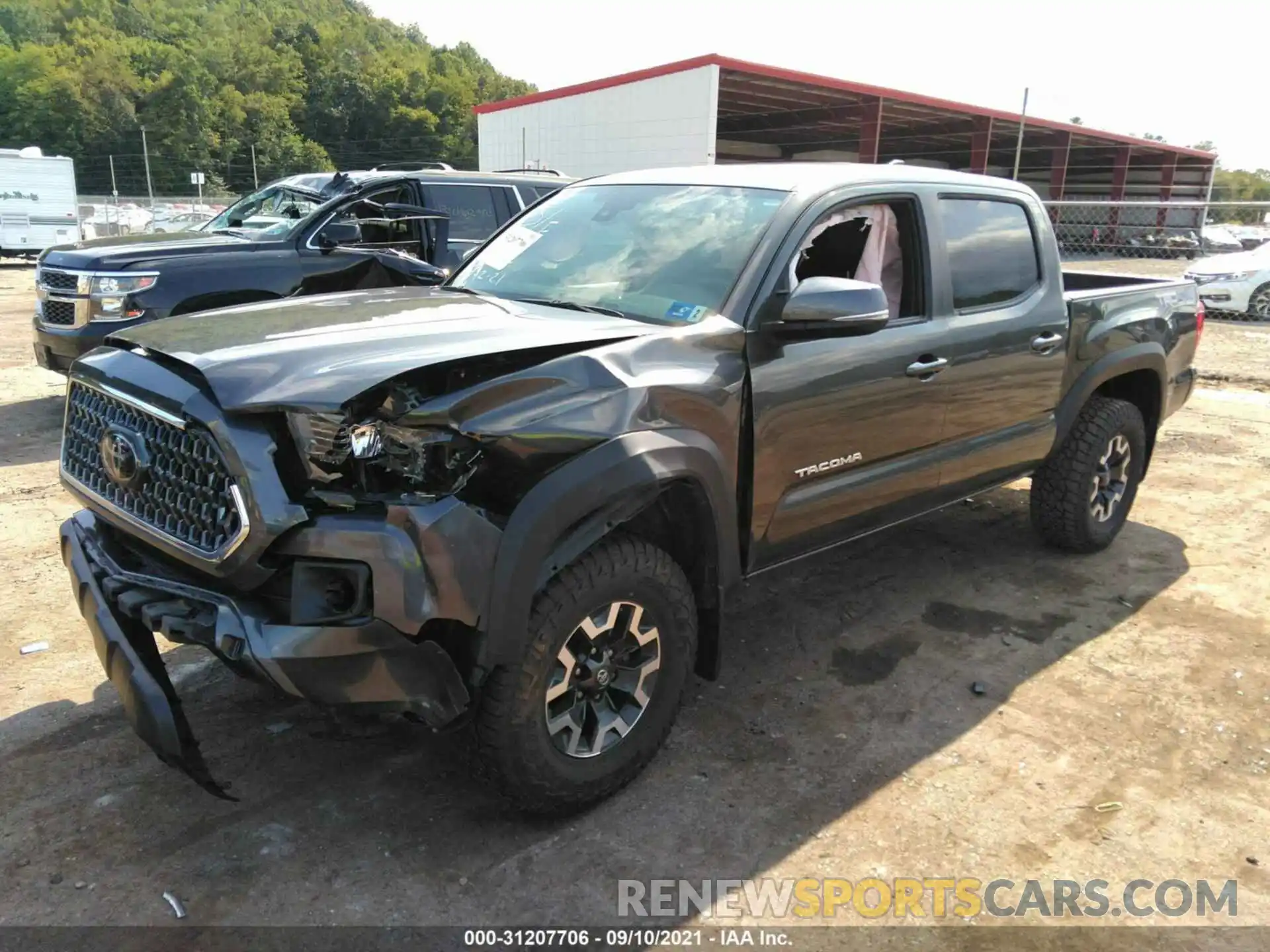 2 Photograph of a damaged car 3TMCZ5AN9KM220599 TOYOTA TACOMA 4WD 2019