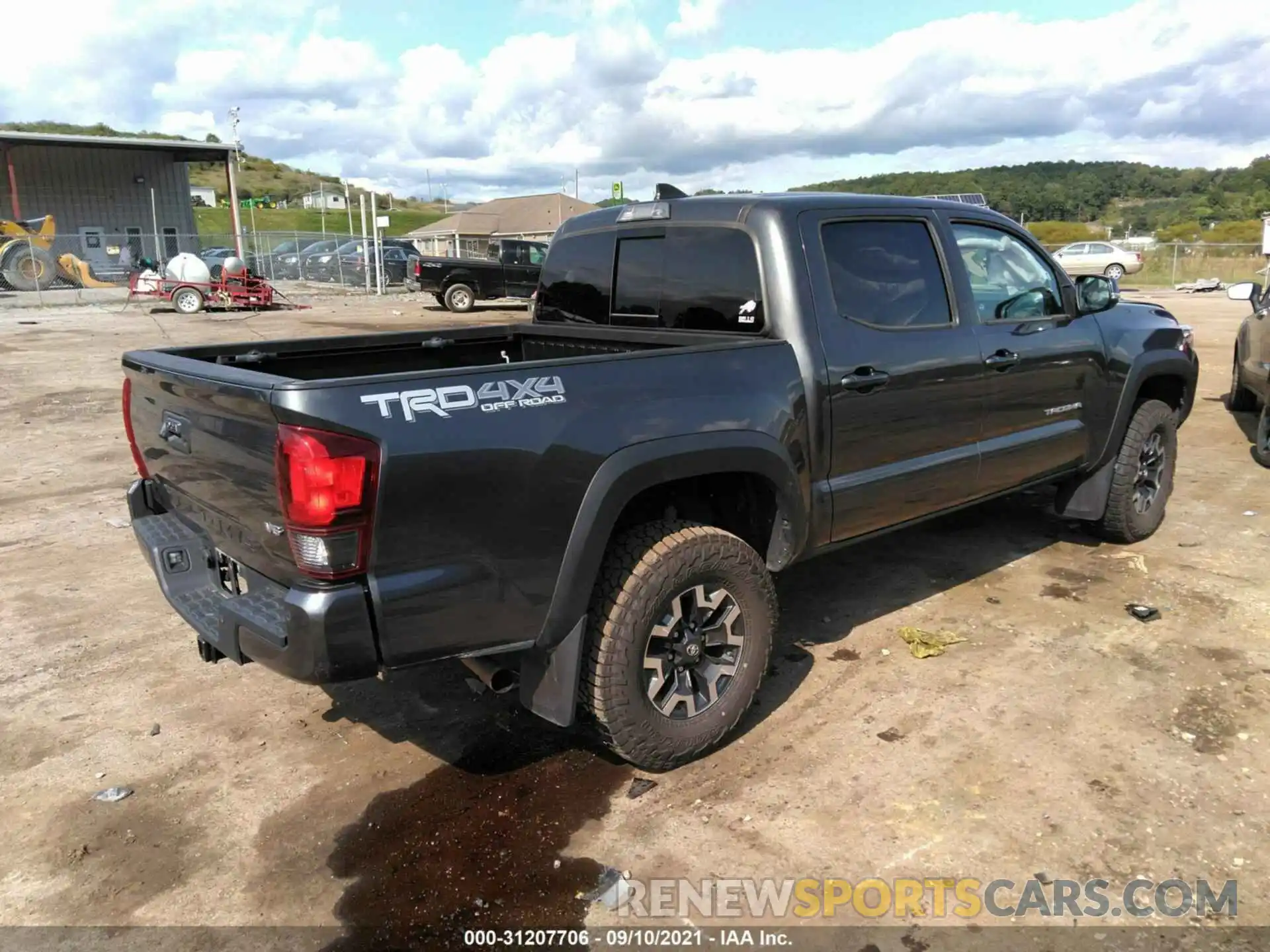 4 Photograph of a damaged car 3TMCZ5AN9KM220599 TOYOTA TACOMA 4WD 2019