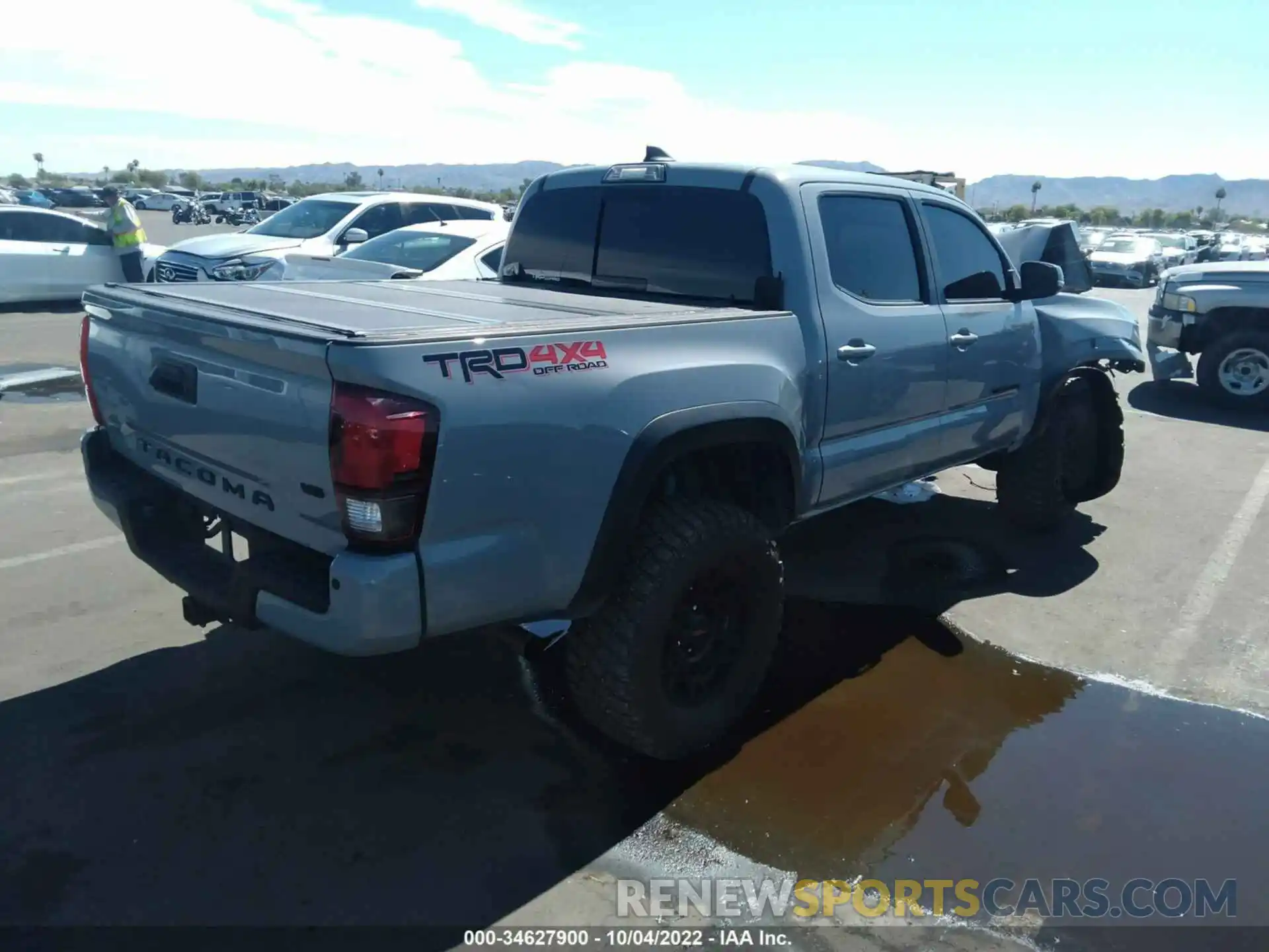 4 Photograph of a damaged car 3TMCZ5AN9KM237001 TOYOTA TACOMA 4WD 2019