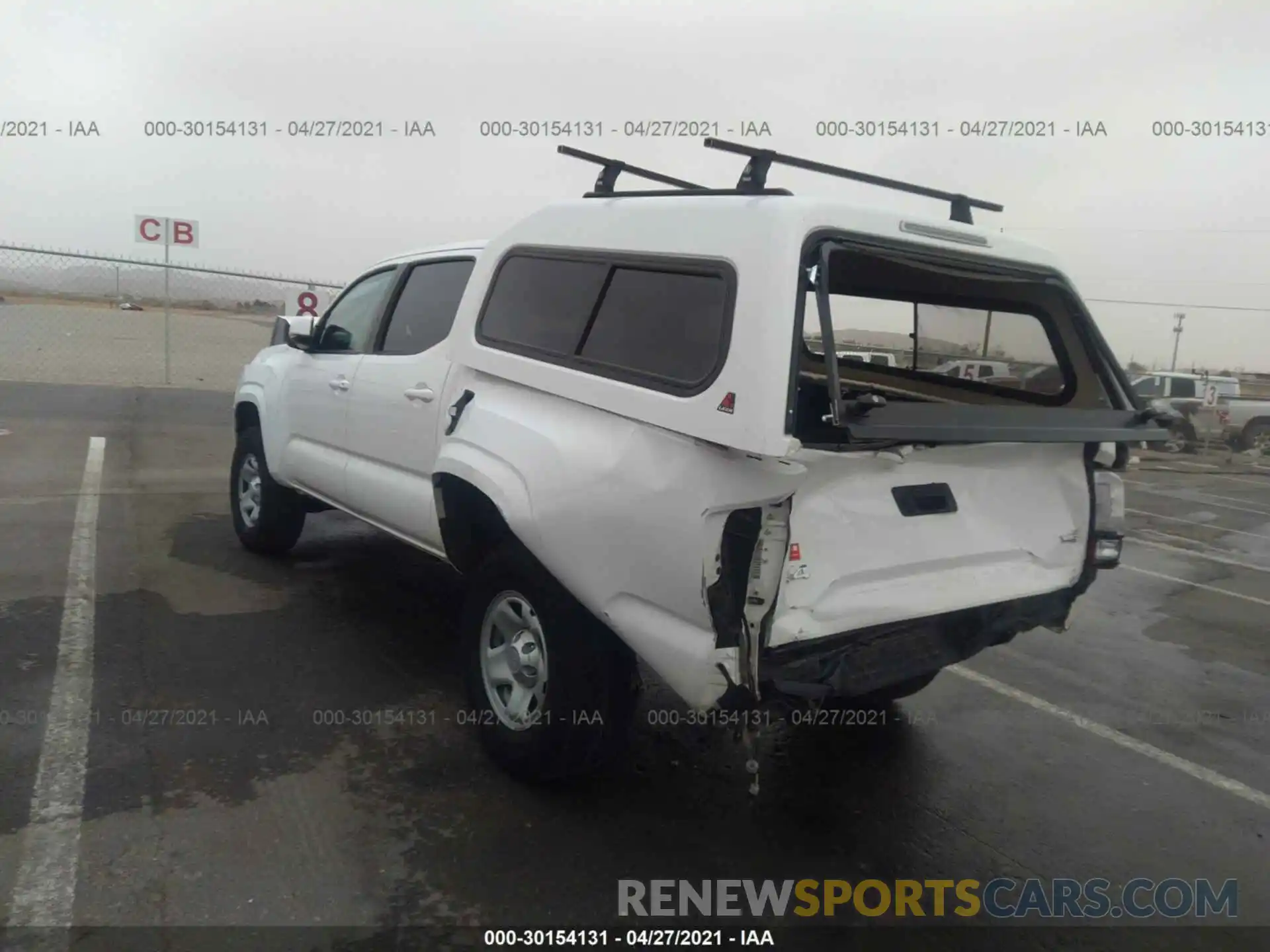 3 Photograph of a damaged car 3TMCZ5AN9KM239167 TOYOTA TACOMA 4WD 2019