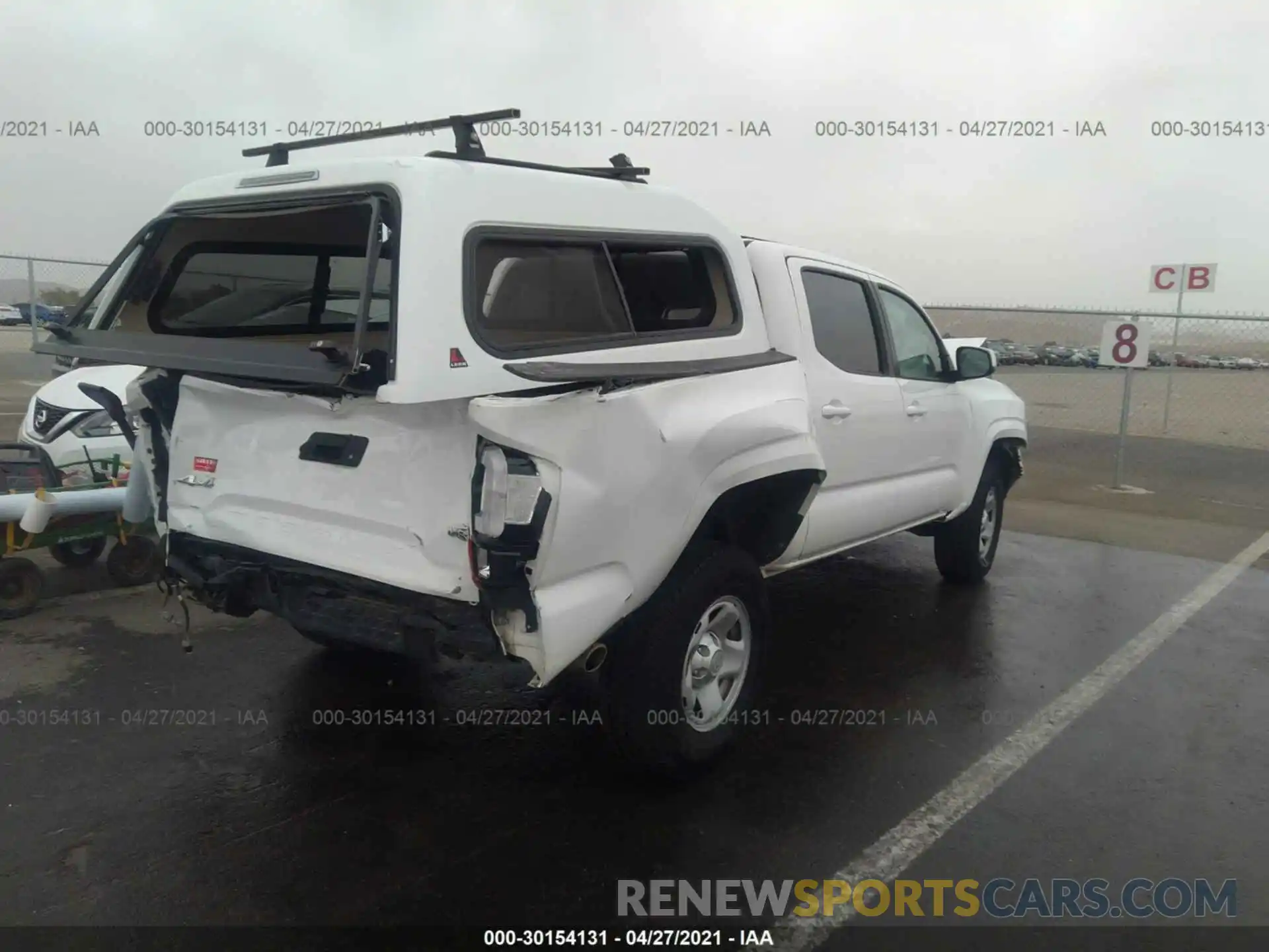 4 Photograph of a damaged car 3TMCZ5AN9KM239167 TOYOTA TACOMA 4WD 2019