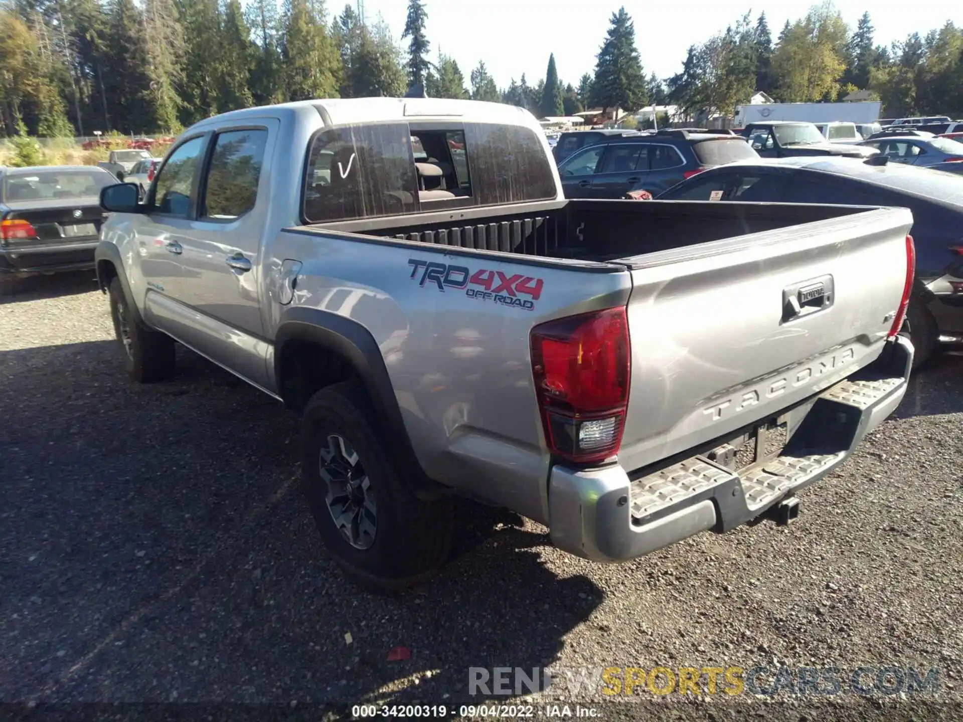 3 Photograph of a damaged car 3TMCZ5AN9KM252596 TOYOTA TACOMA 4WD 2019