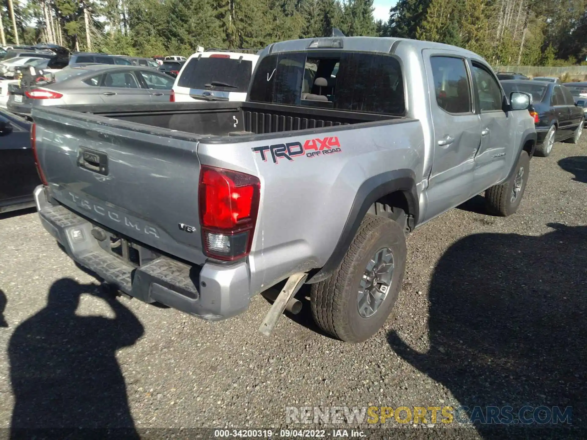 4 Photograph of a damaged car 3TMCZ5AN9KM252596 TOYOTA TACOMA 4WD 2019