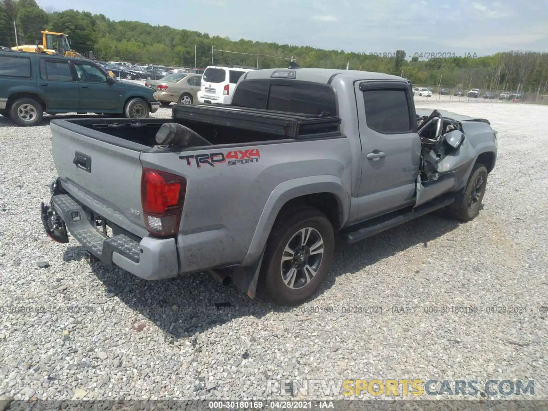 4 Photograph of a damaged car 3TMCZ5AN9KM253666 TOYOTA TACOMA 4WD 2019