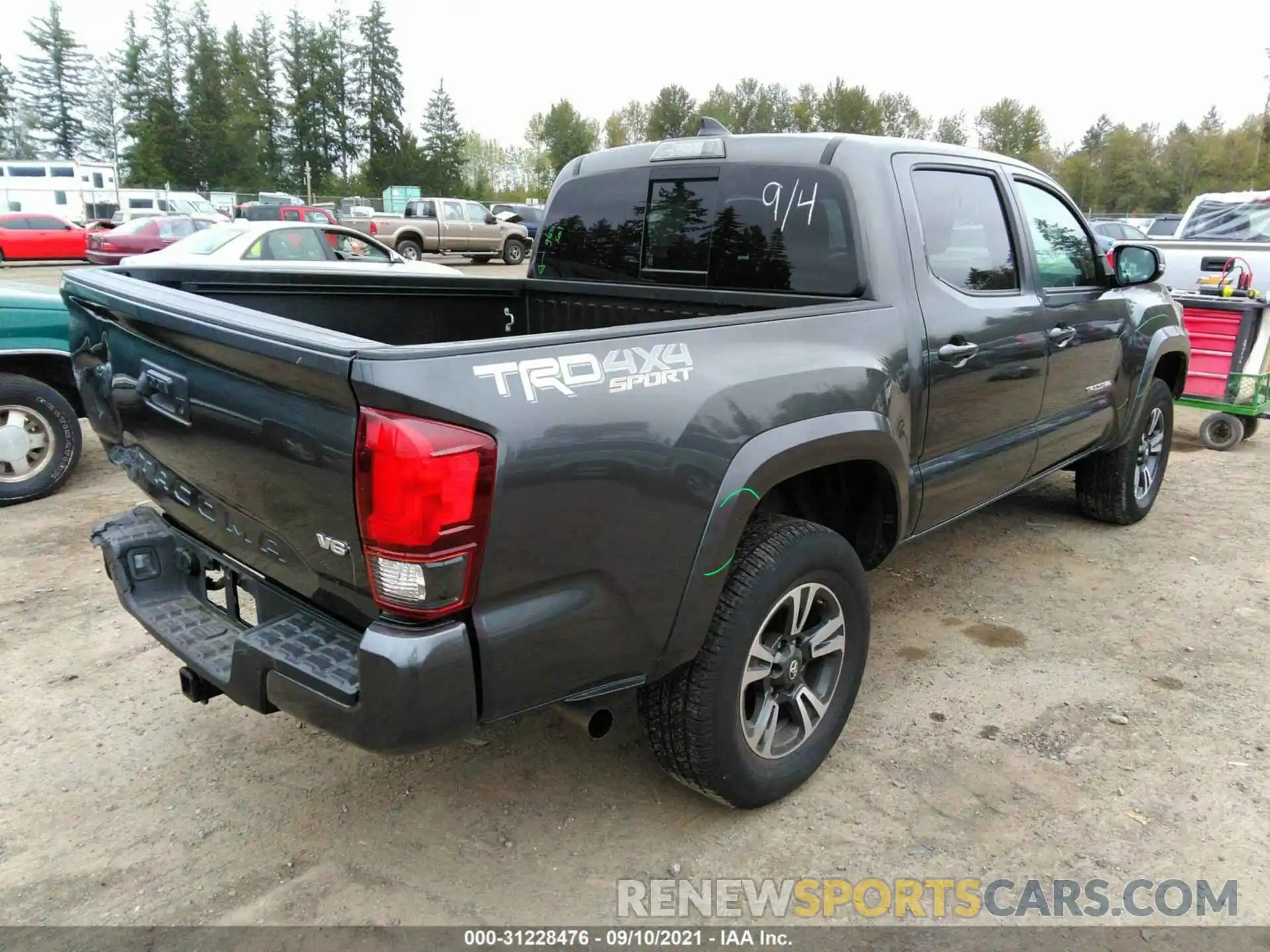 4 Photograph of a damaged car 3TMCZ5AN9KM263310 TOYOTA TACOMA 4WD 2019