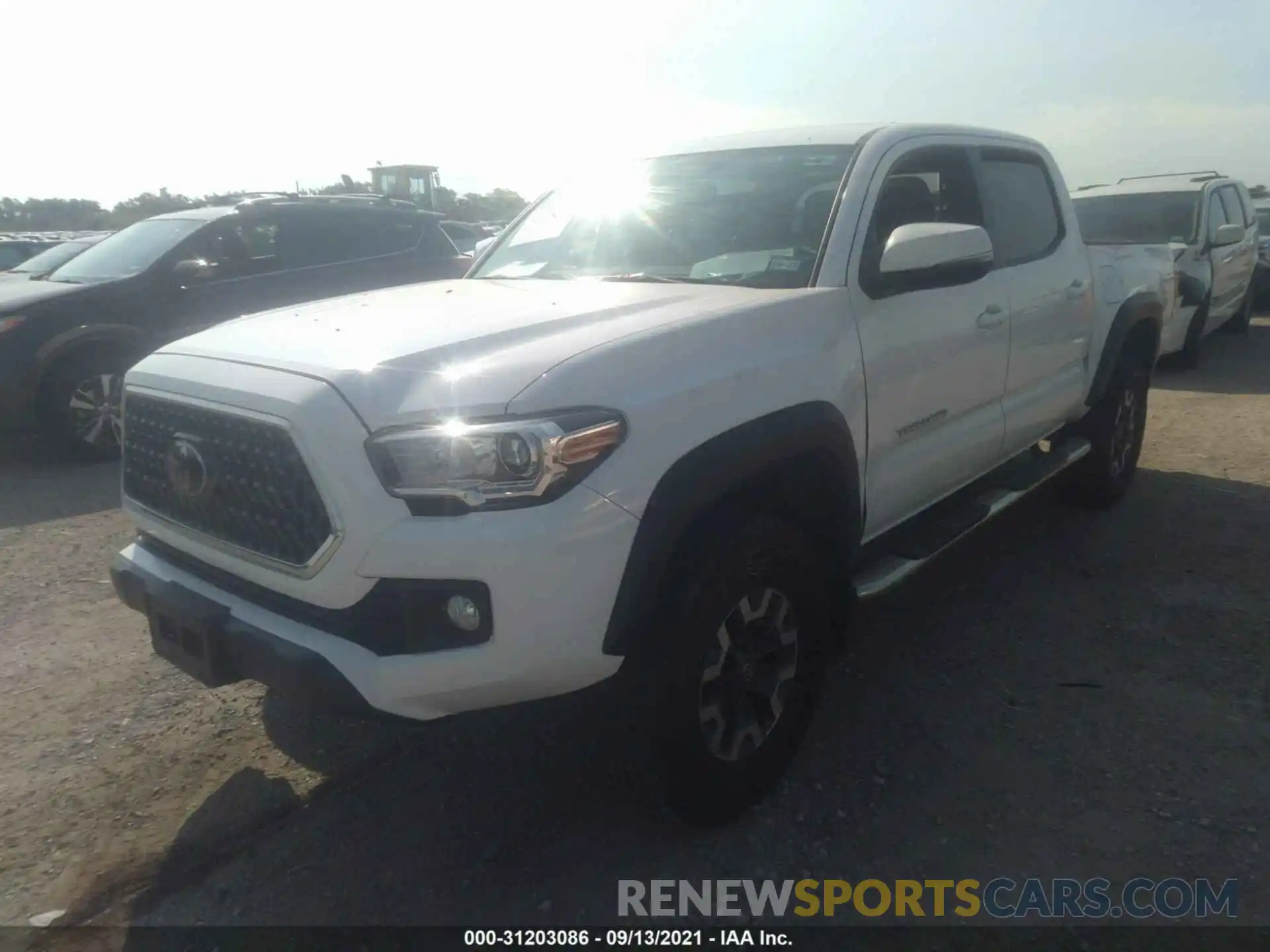 2 Фотография поврежденного автомобиля 3TMCZ5AN9KM269186 TOYOTA TACOMA 4WD 2019