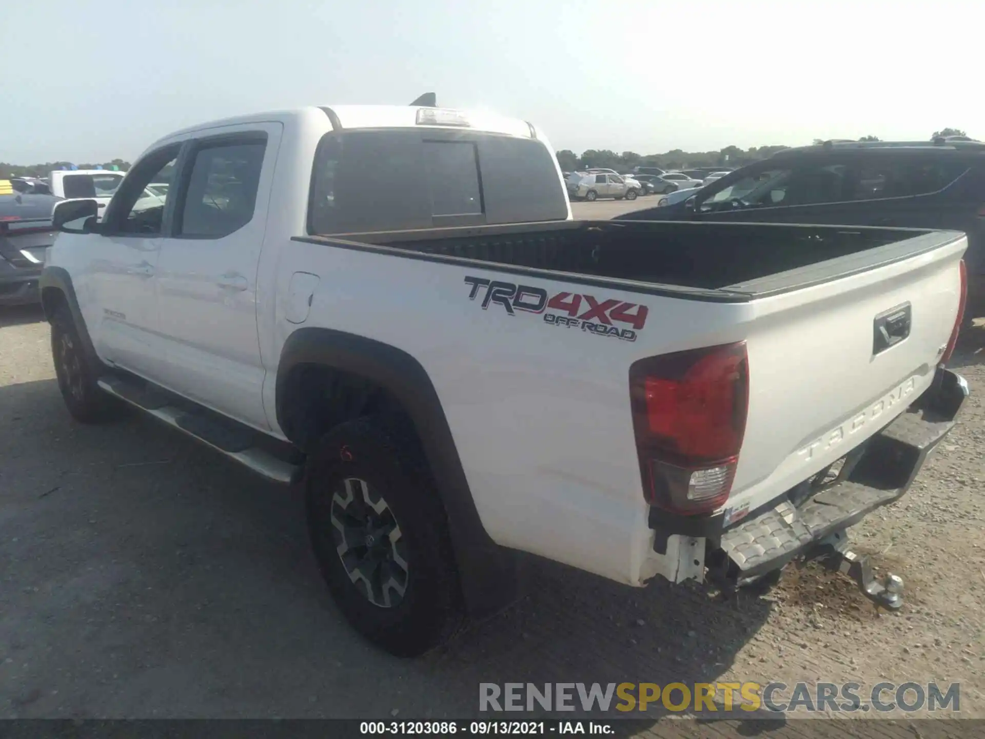 3 Photograph of a damaged car 3TMCZ5AN9KM269186 TOYOTA TACOMA 4WD 2019