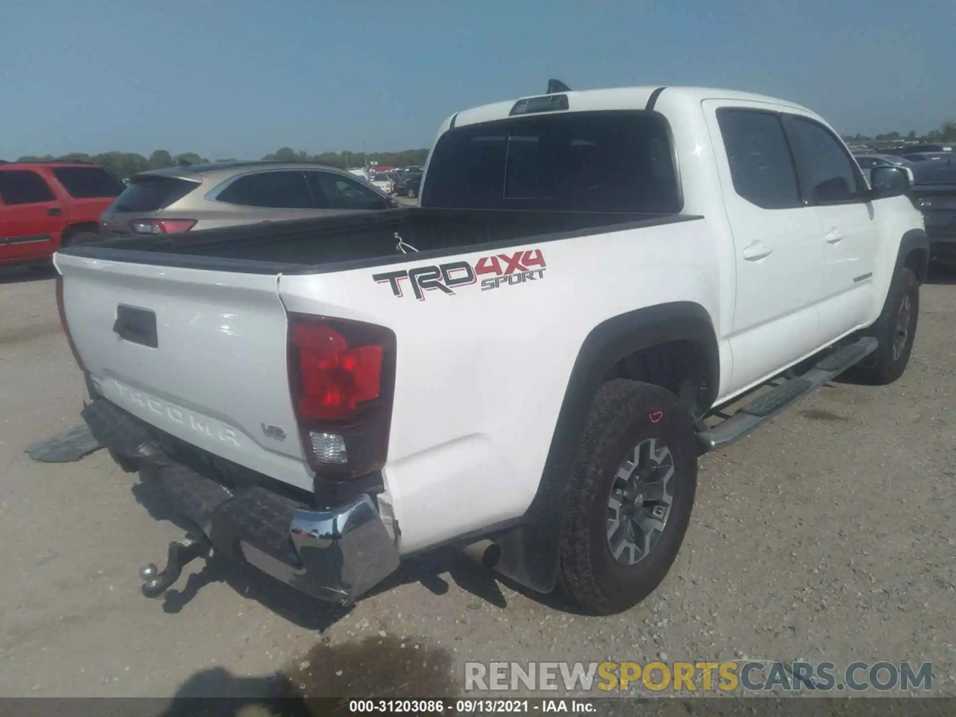 4 Photograph of a damaged car 3TMCZ5AN9KM269186 TOYOTA TACOMA 4WD 2019