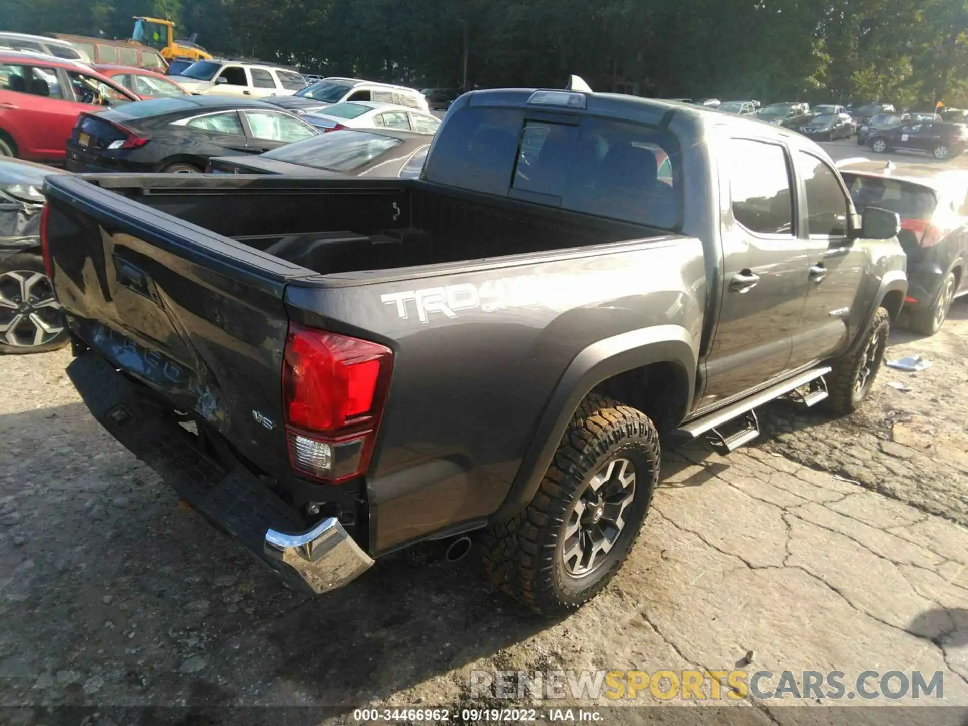 4 Photograph of a damaged car 3TMCZ5AN9KM277739 TOYOTA TACOMA 4WD 2019