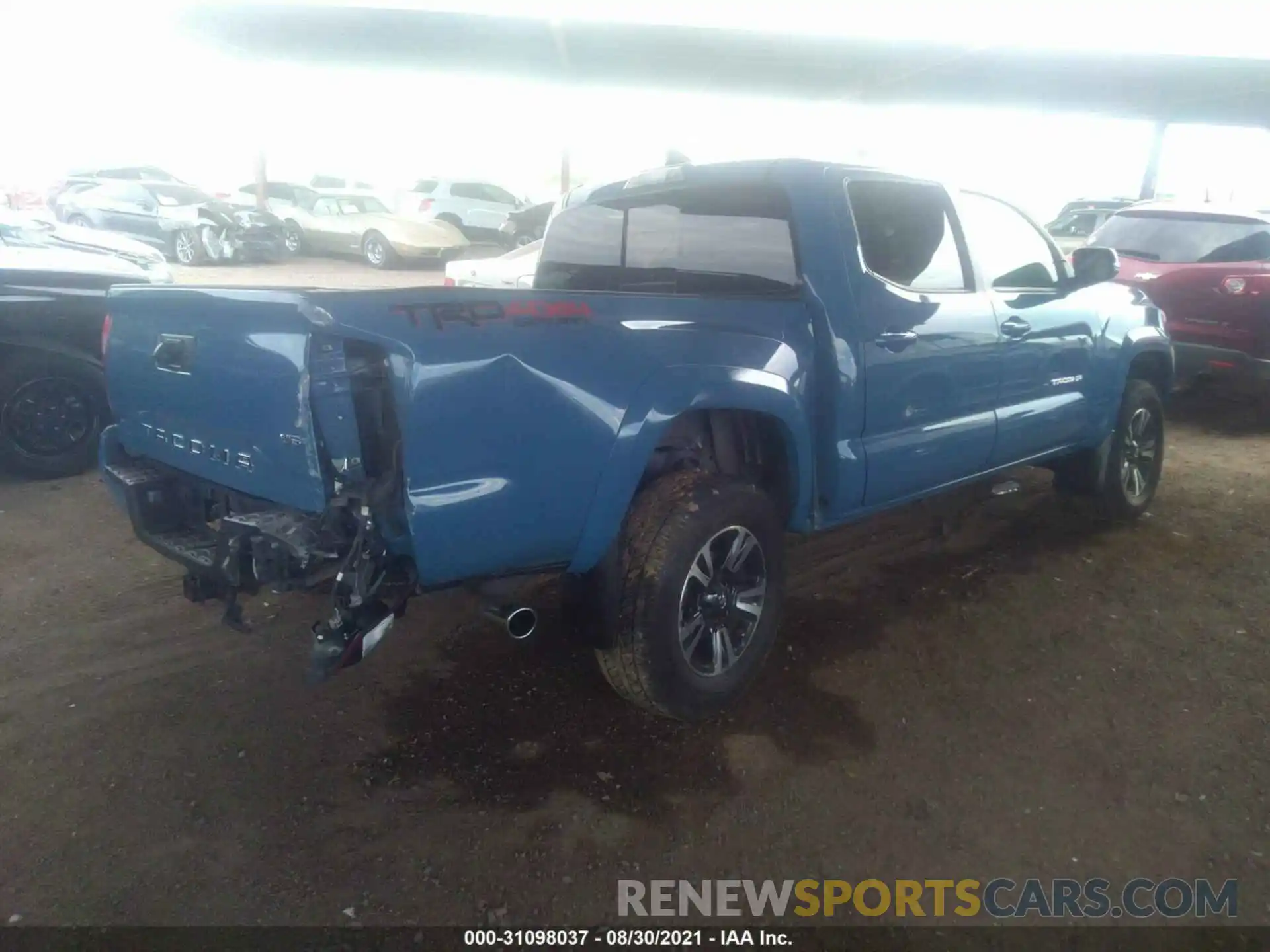 4 Photograph of a damaged car 3TMCZ5AN9KM280074 TOYOTA TACOMA 4WD 2019