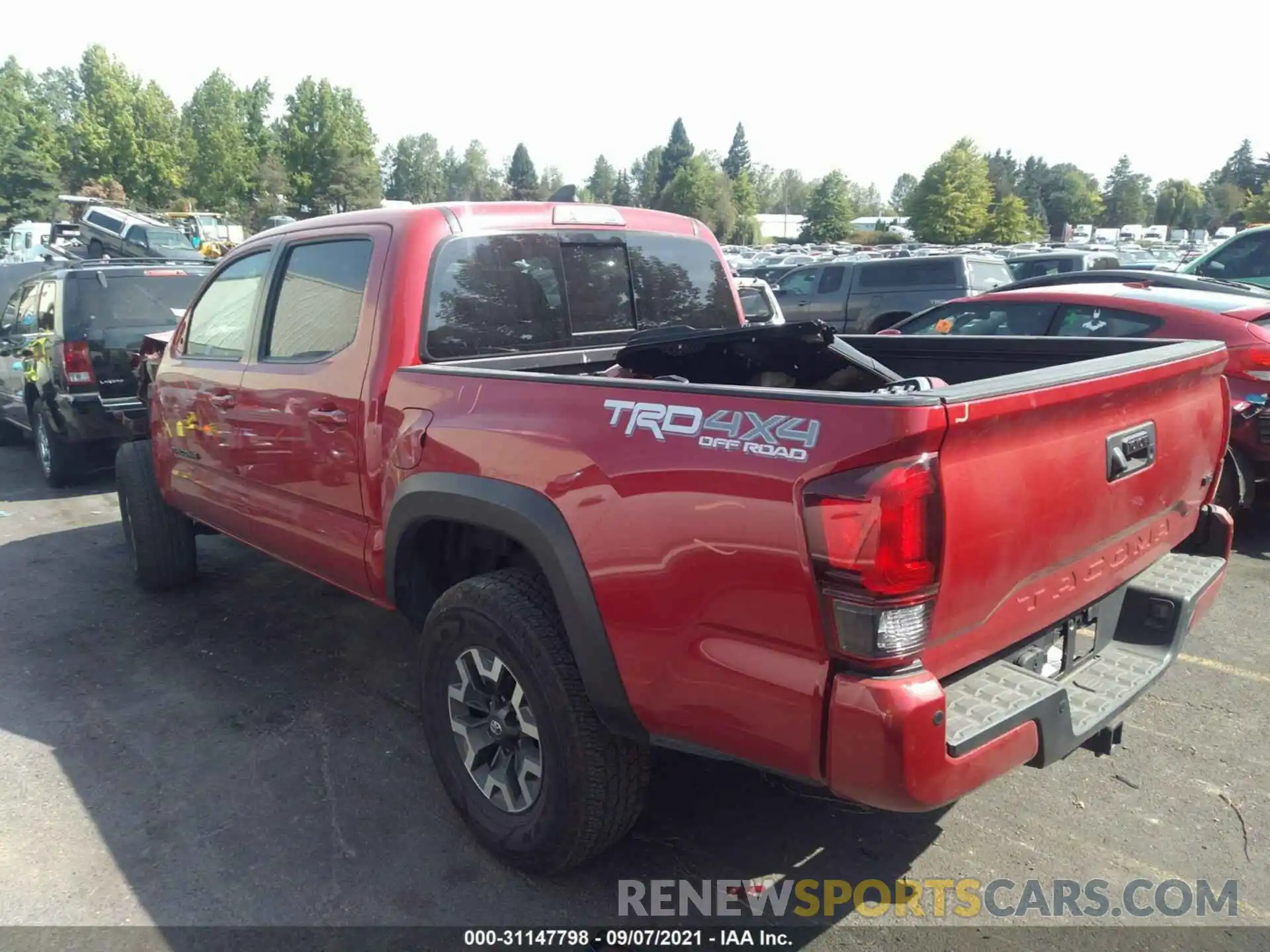 3 Photograph of a damaged car 3TMCZ5AN9KM280625 TOYOTA TACOMA 4WD 2019