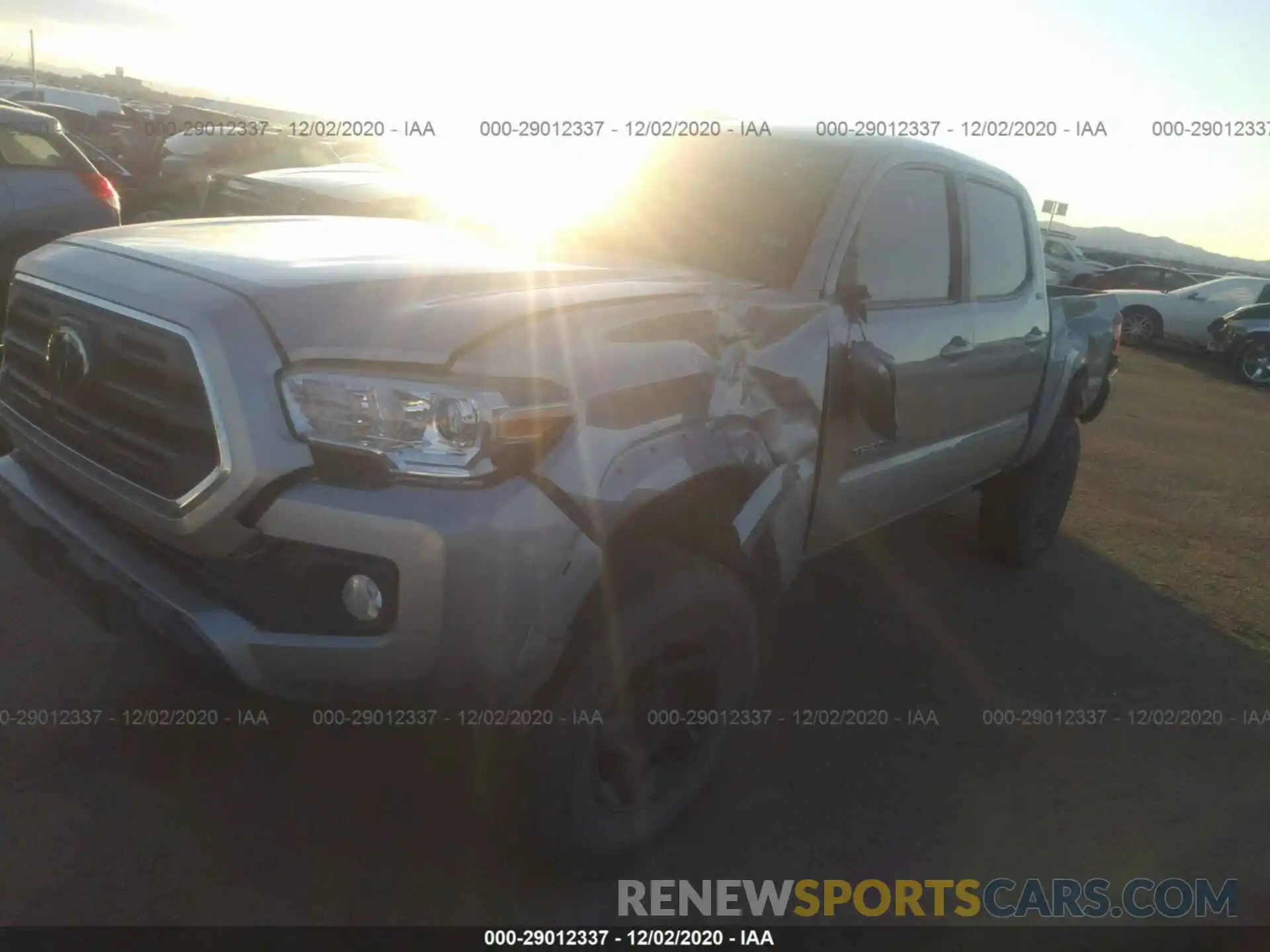 2 Photograph of a damaged car 3TMCZ5ANXKM196605 TOYOTA TACOMA 4WD 2019