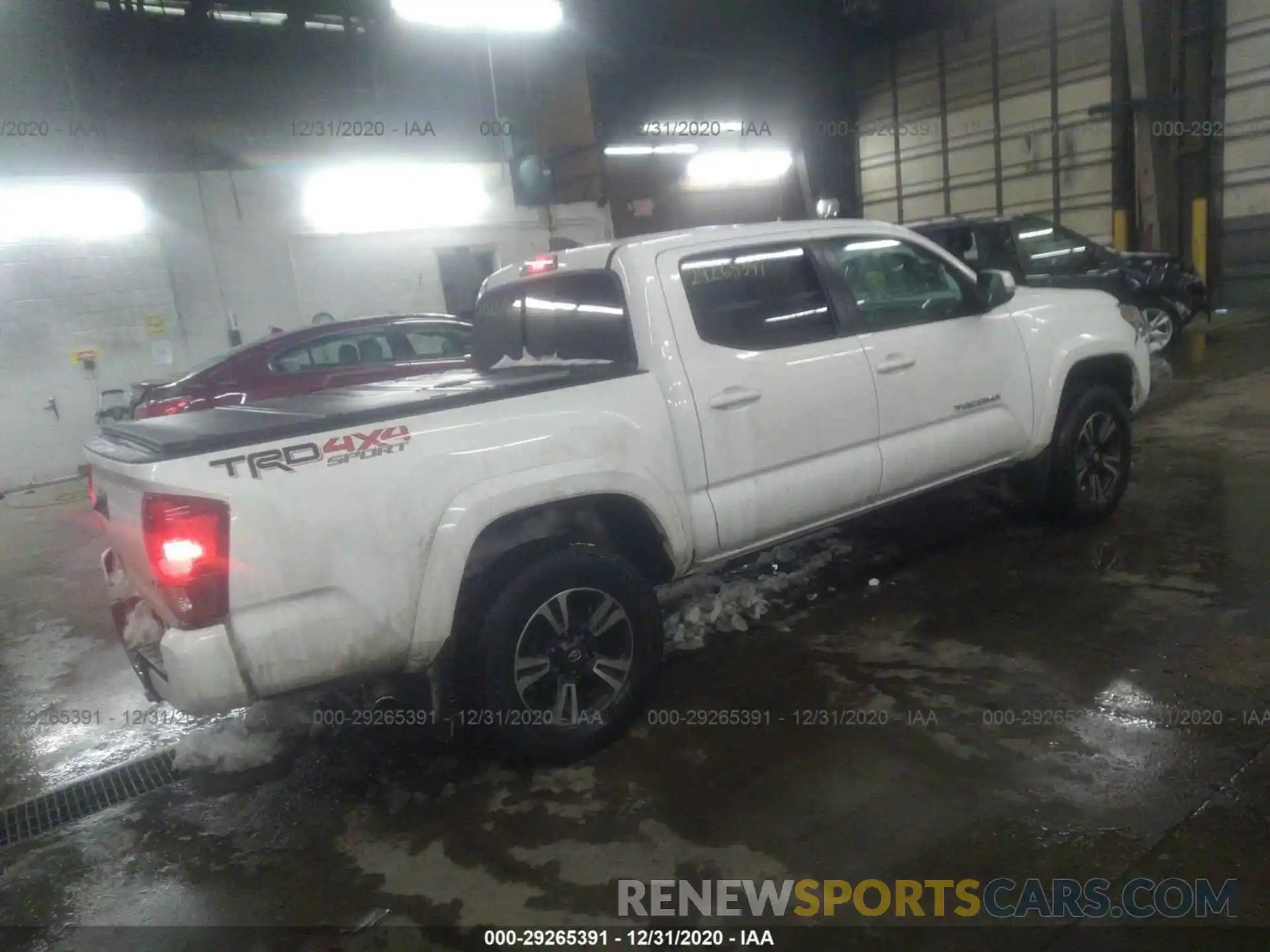 4 Photograph of a damaged car 3TMCZ5ANXKM211717 TOYOTA TACOMA 4WD 2019