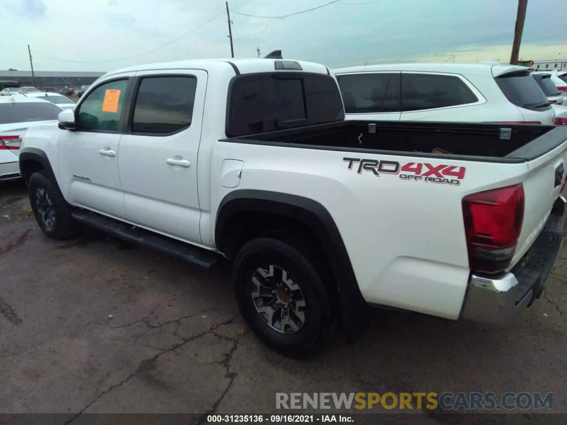 3 Photograph of a damaged car 3TMCZ5ANXKM230302 TOYOTA TACOMA 4WD 2019