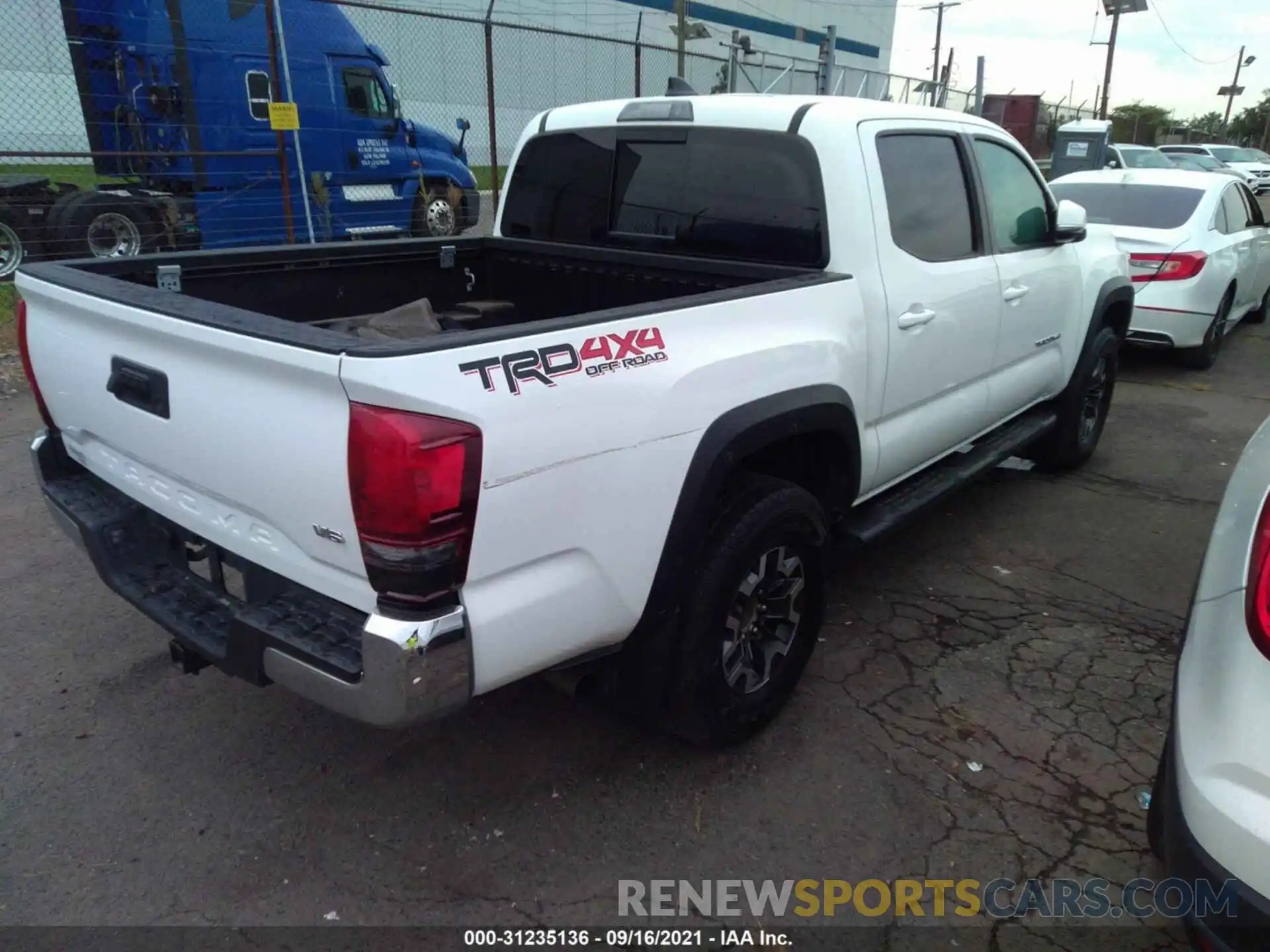 4 Photograph of a damaged car 3TMCZ5ANXKM230302 TOYOTA TACOMA 4WD 2019