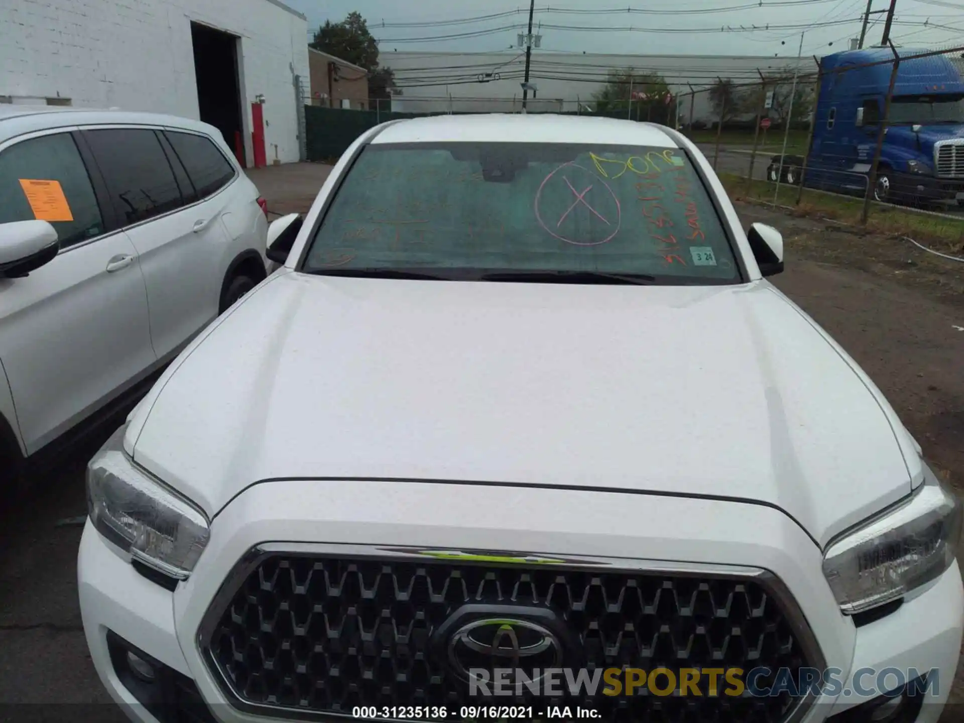 6 Photograph of a damaged car 3TMCZ5ANXKM230302 TOYOTA TACOMA 4WD 2019