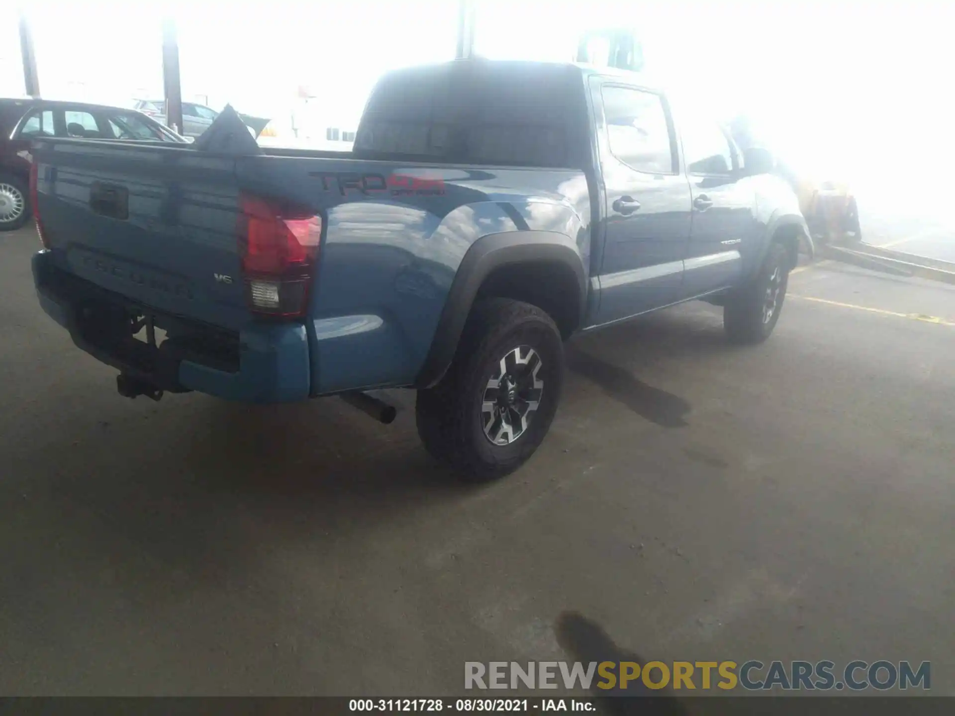 4 Photograph of a damaged car 3TMCZ5ANXKM230350 TOYOTA TACOMA 4WD 2019