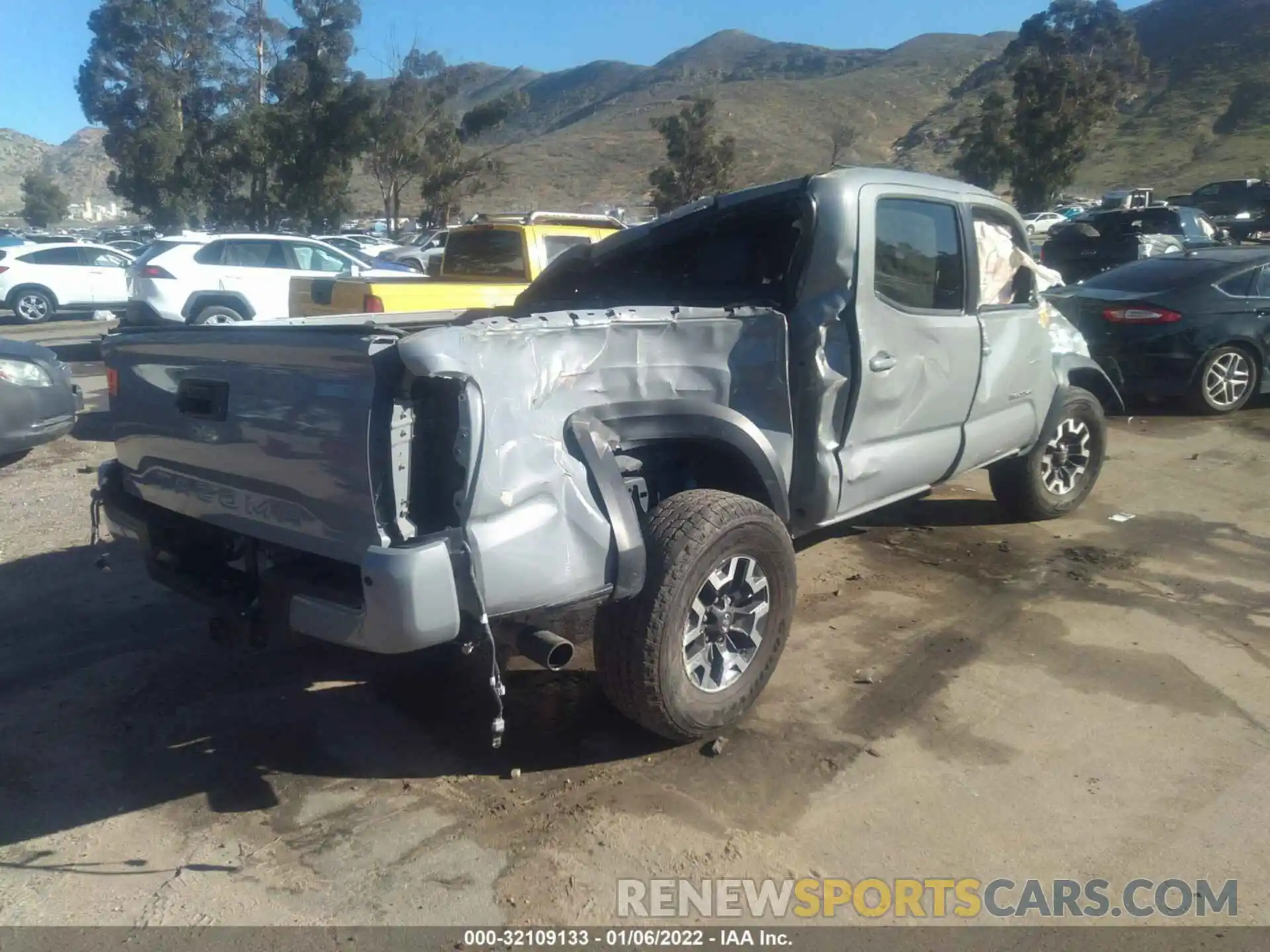 4 Photograph of a damaged car 3TMCZ5ANXKM231000 TOYOTA TACOMA 4WD 2019