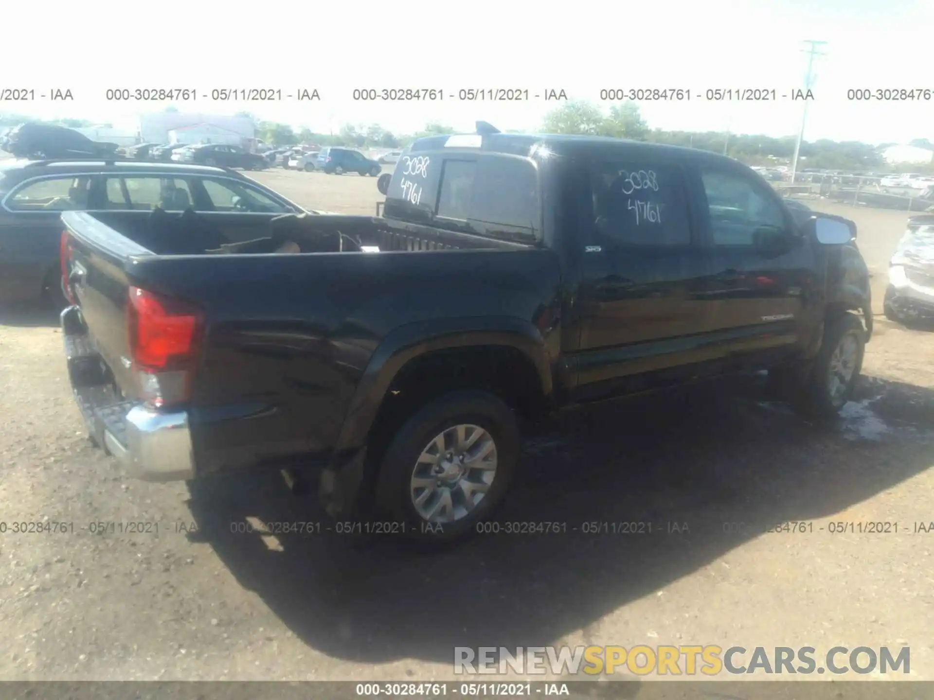 4 Photograph of a damaged car 3TMCZ5ANXKM260593 TOYOTA TACOMA 4WD 2019