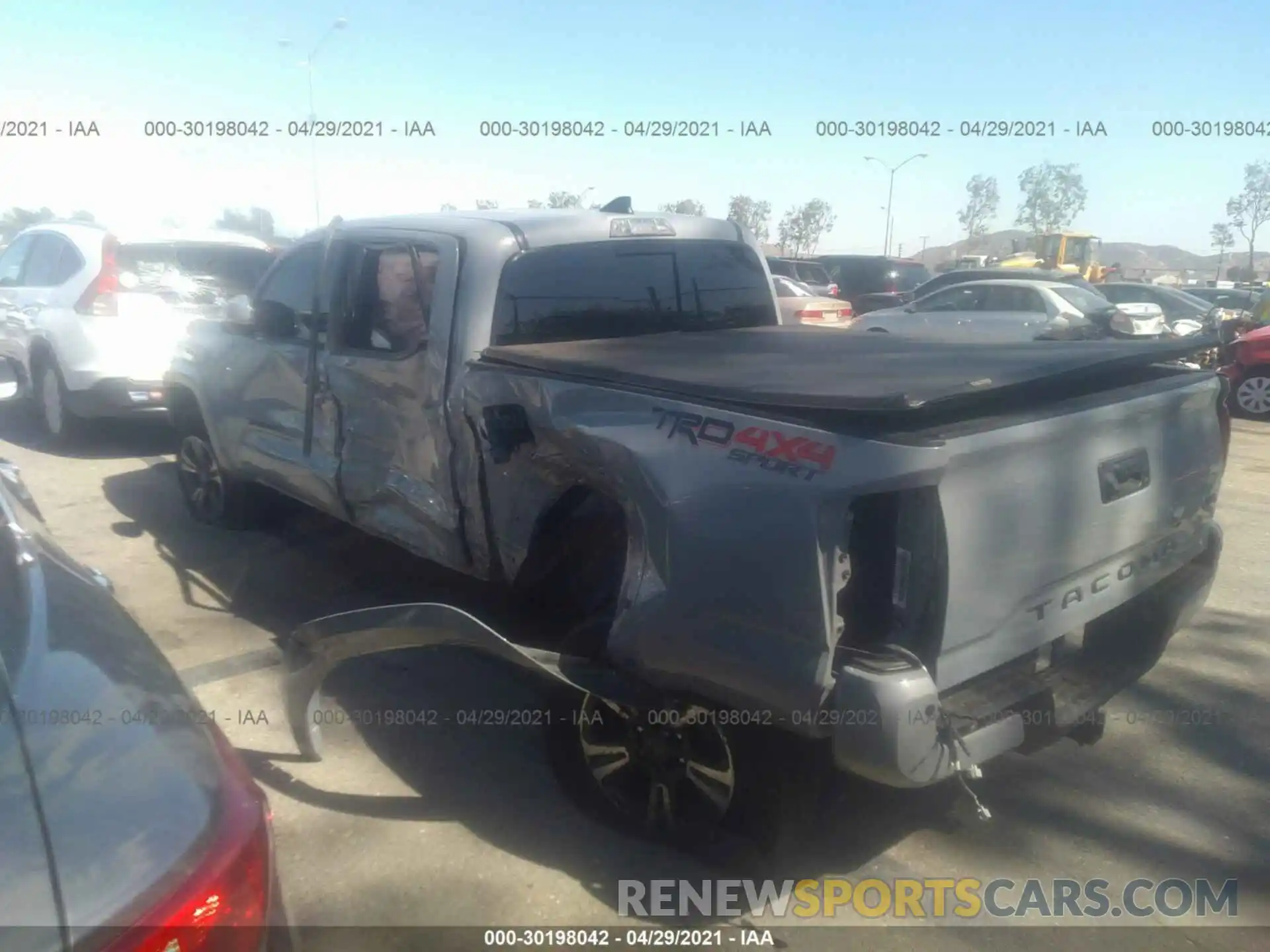 3 Photograph of a damaged car 3TMCZ5ANXKM286577 TOYOTA TACOMA 4WD 2019