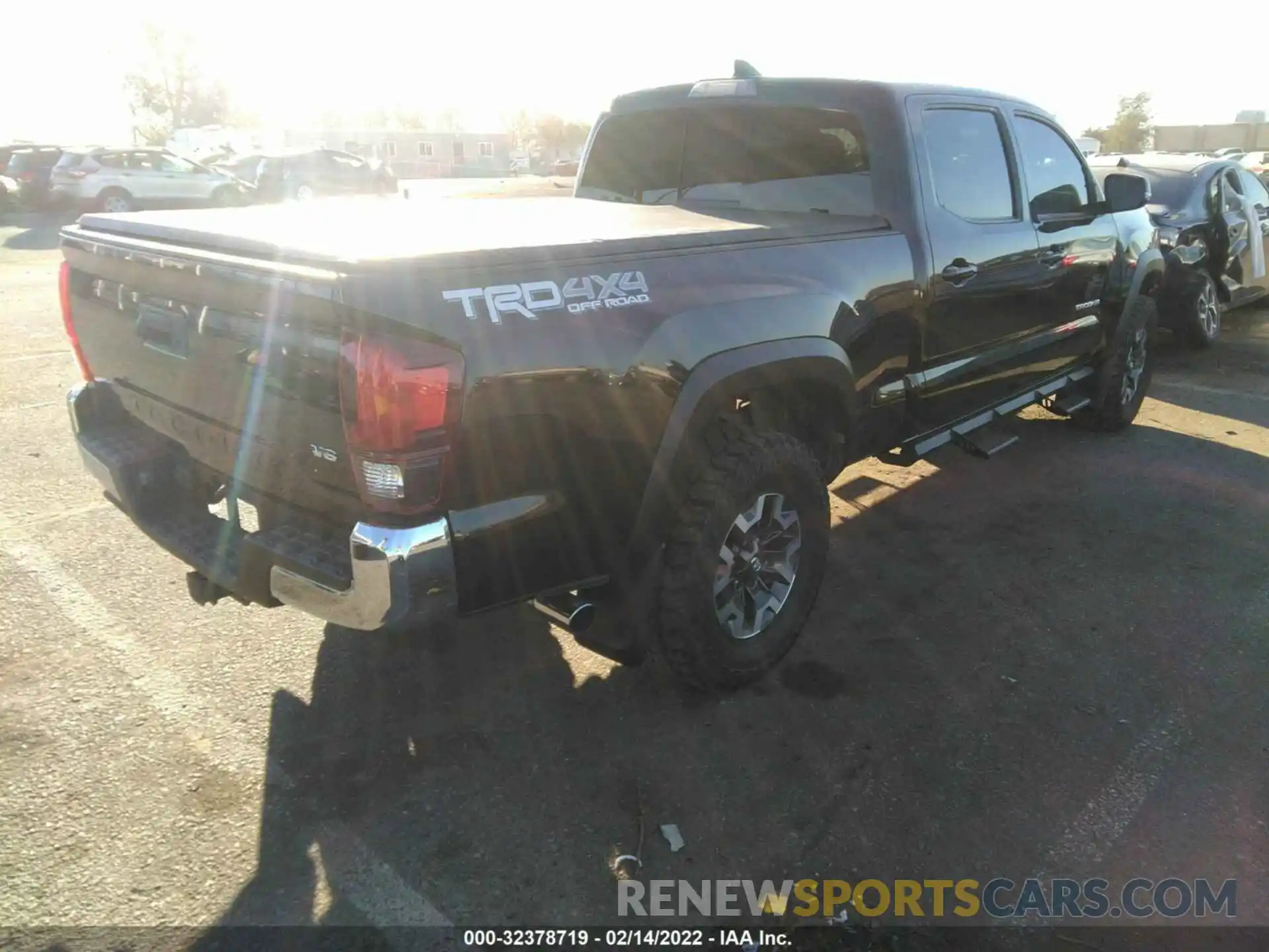 4 Photograph of a damaged car 3TMDZ5BN0KM058039 TOYOTA TACOMA 4WD 2019