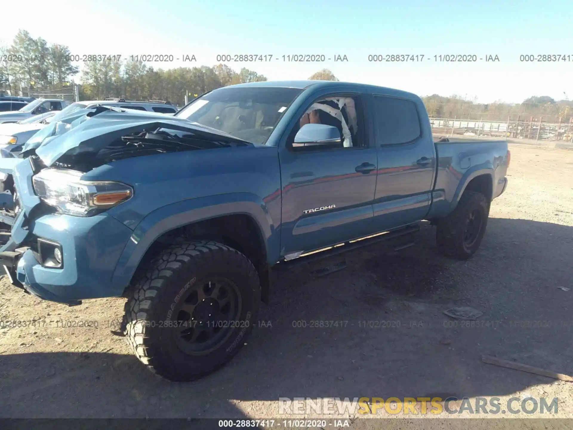 2 Photograph of a damaged car 3TMDZ5BN0KM061913 TOYOTA TACOMA 4WD 2019